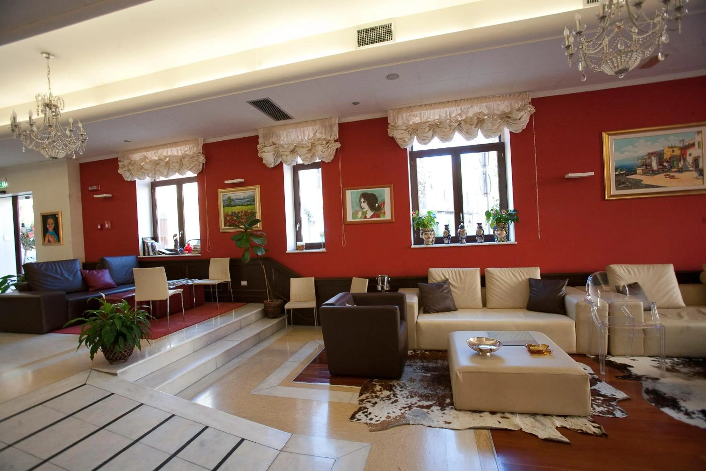 Lobby or reception in La Chicca Palace Hotel