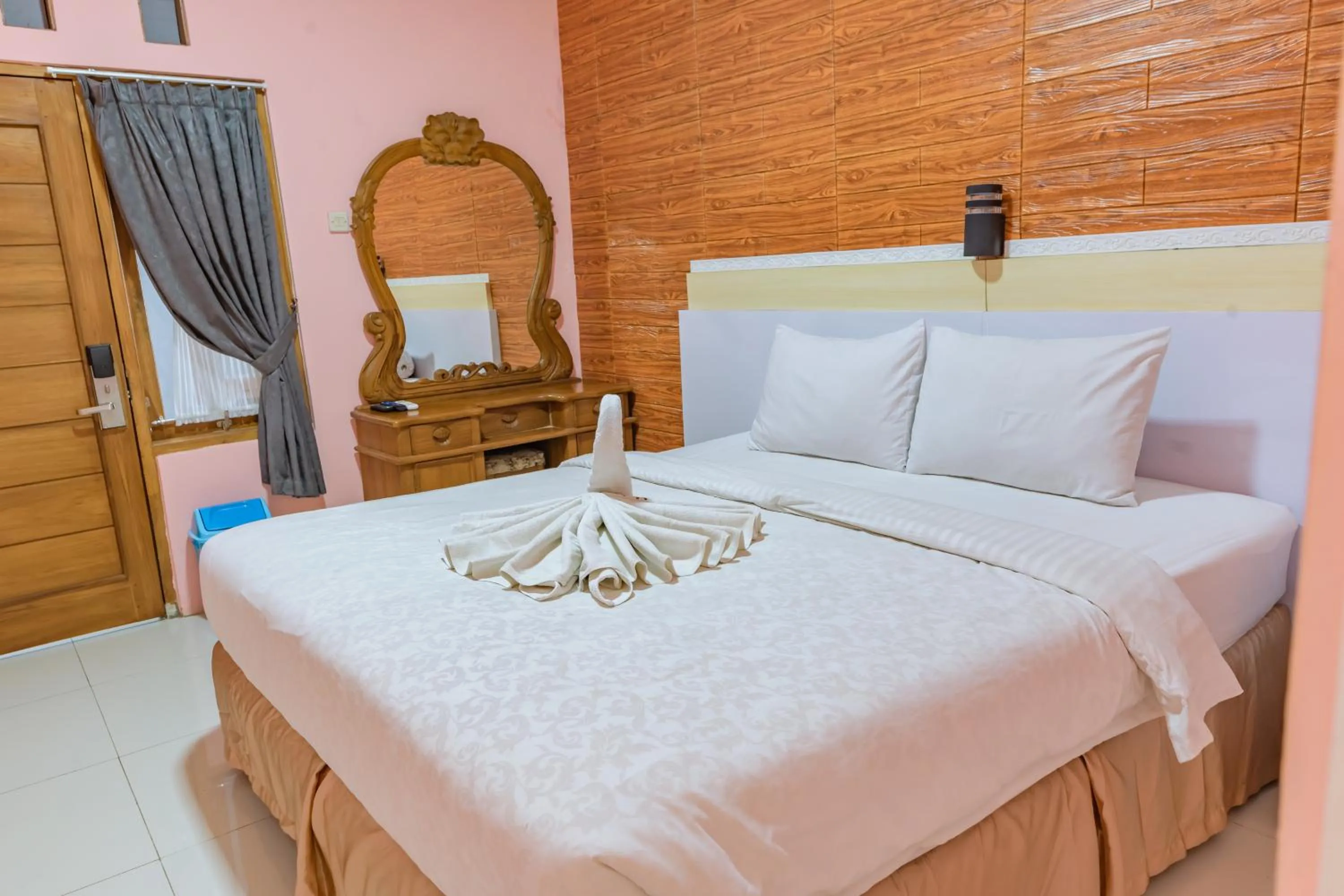 Bed in Metro Malioboro Living