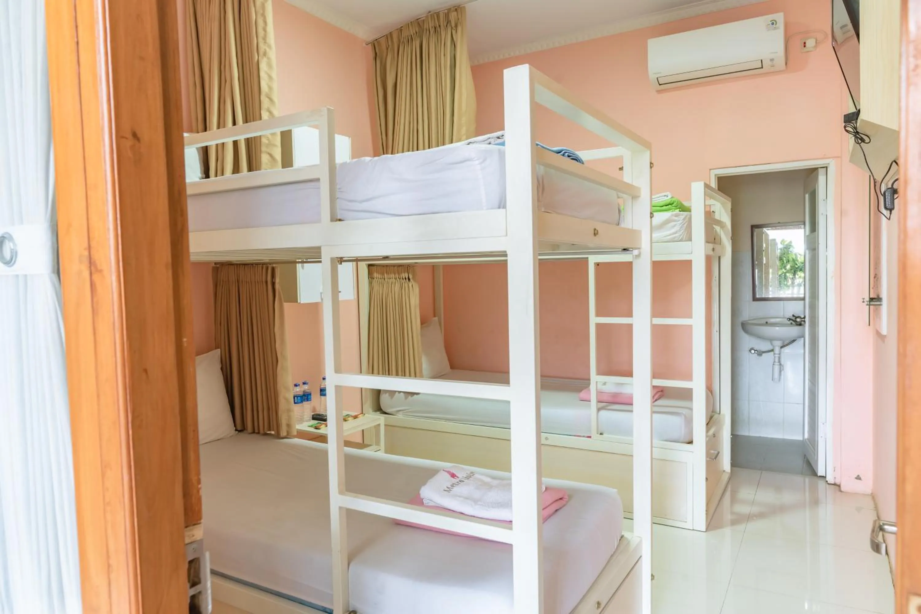 Bed in Metro Malioboro Living