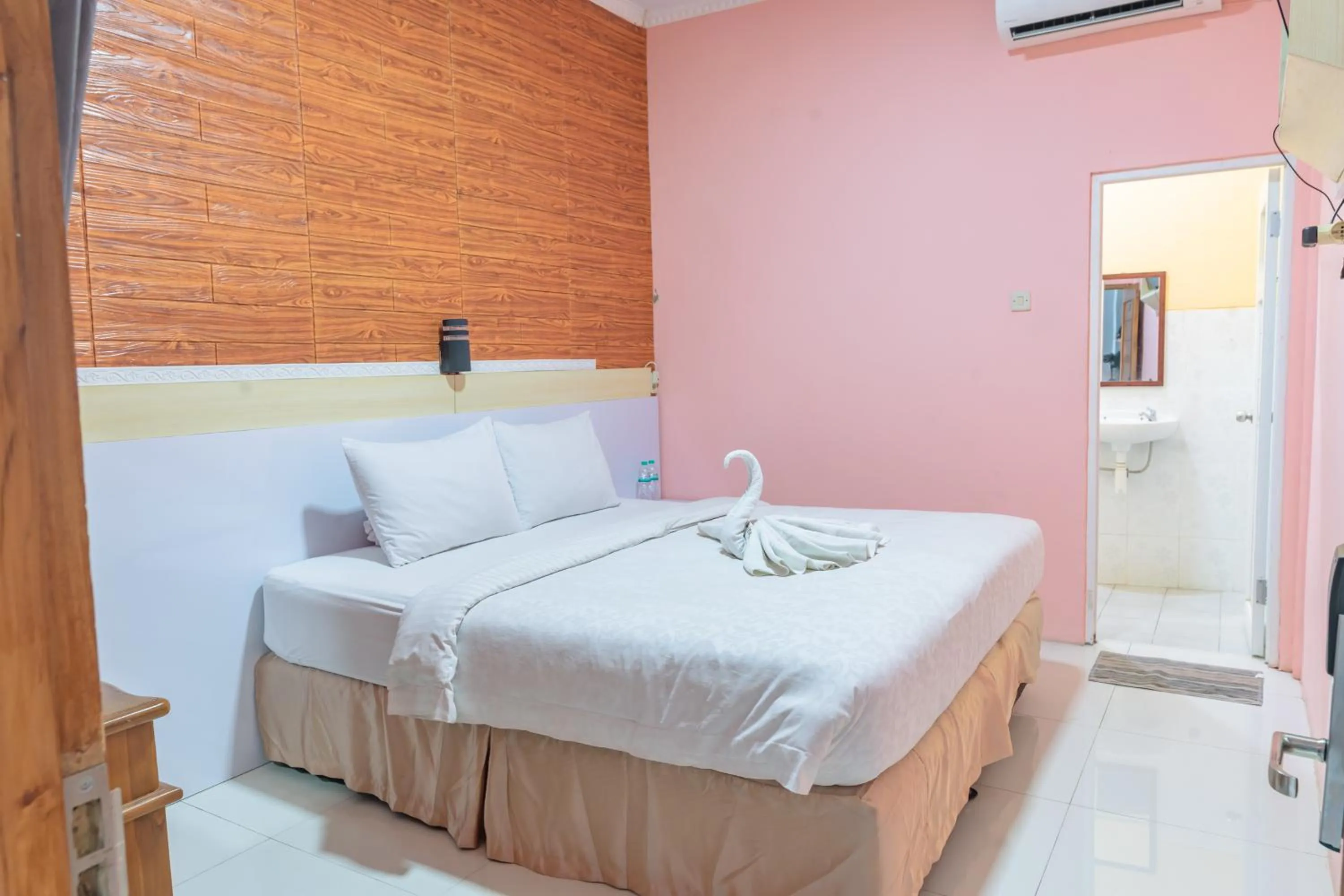 Bed in Metro Malioboro Living