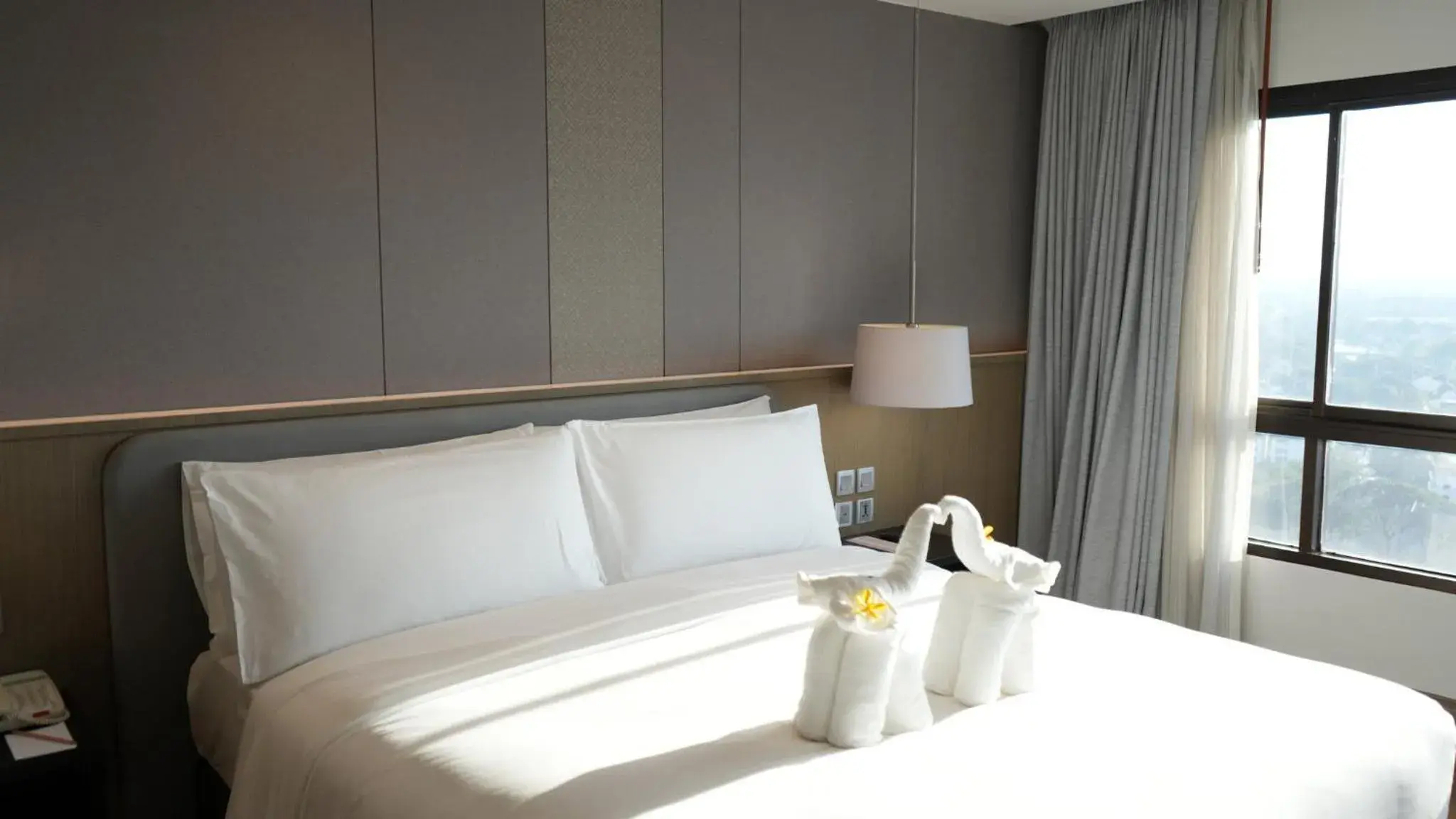 Photo of the whole room, Bed in Centara Riverside Hotel Chiang Mai Photo of the whole room, Bed in Centara Riverside Hotel Chiang Mai