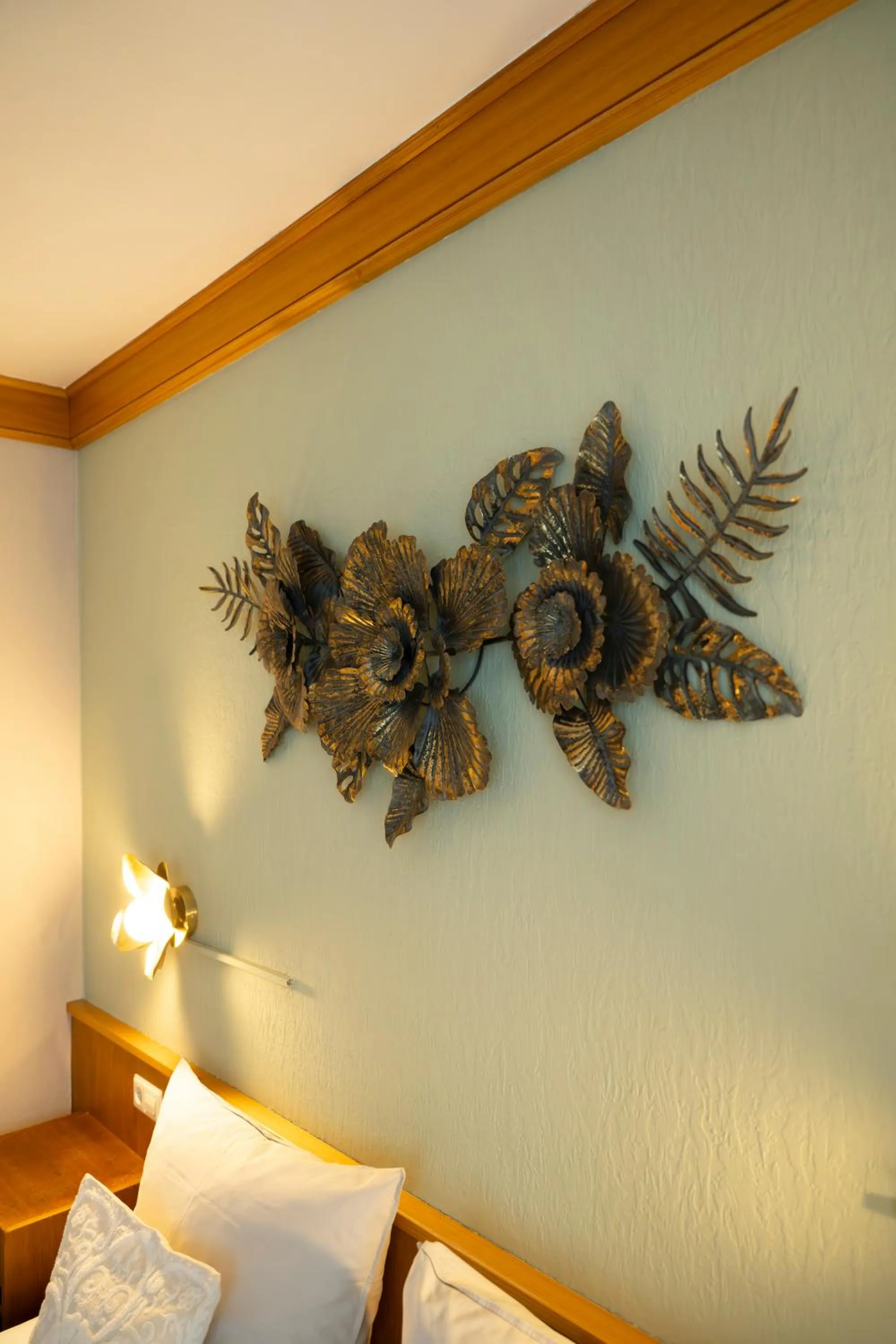 Decorative detail, Bed in Hotel Gülser Weinstube