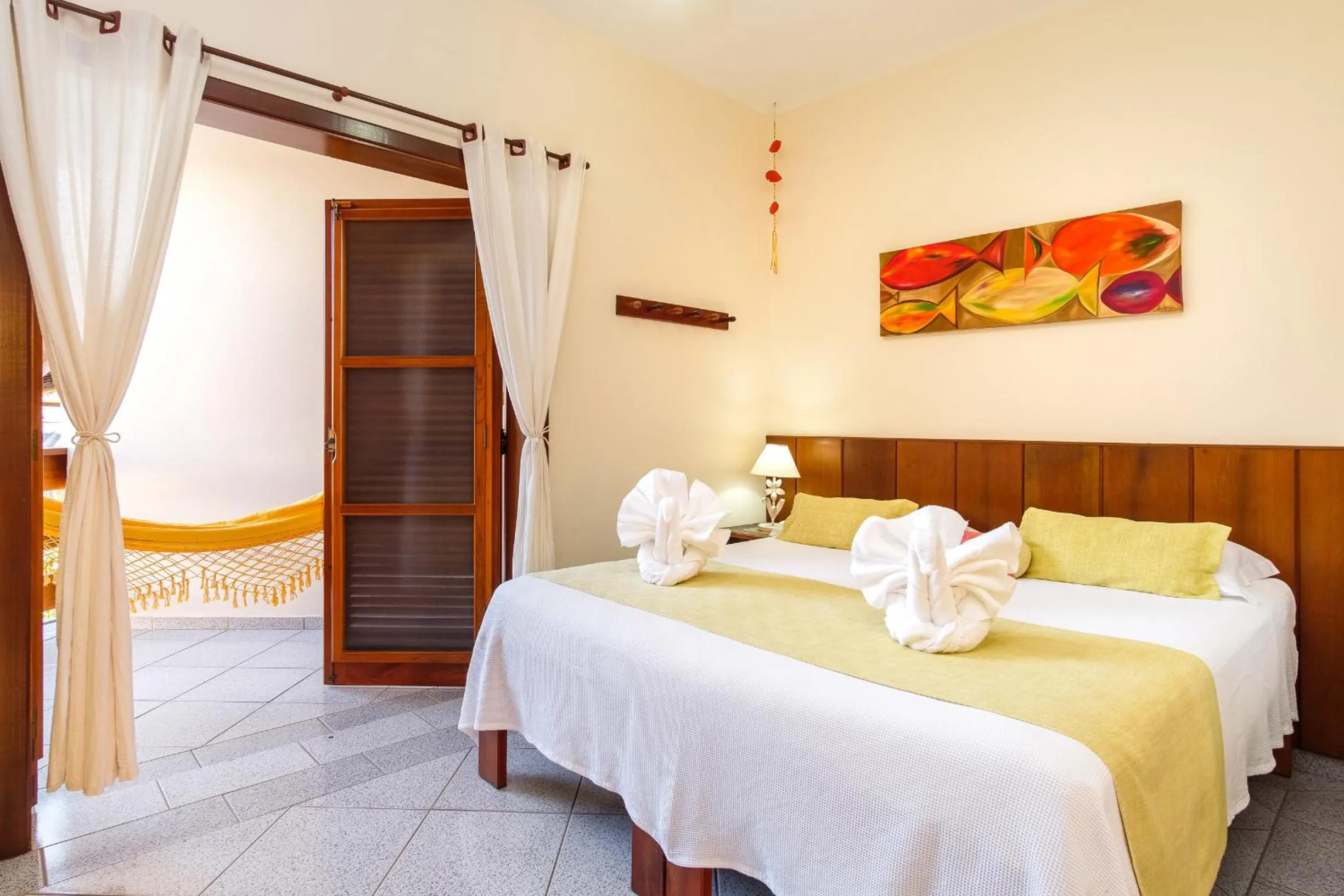 Bed in Pousada Vivamar