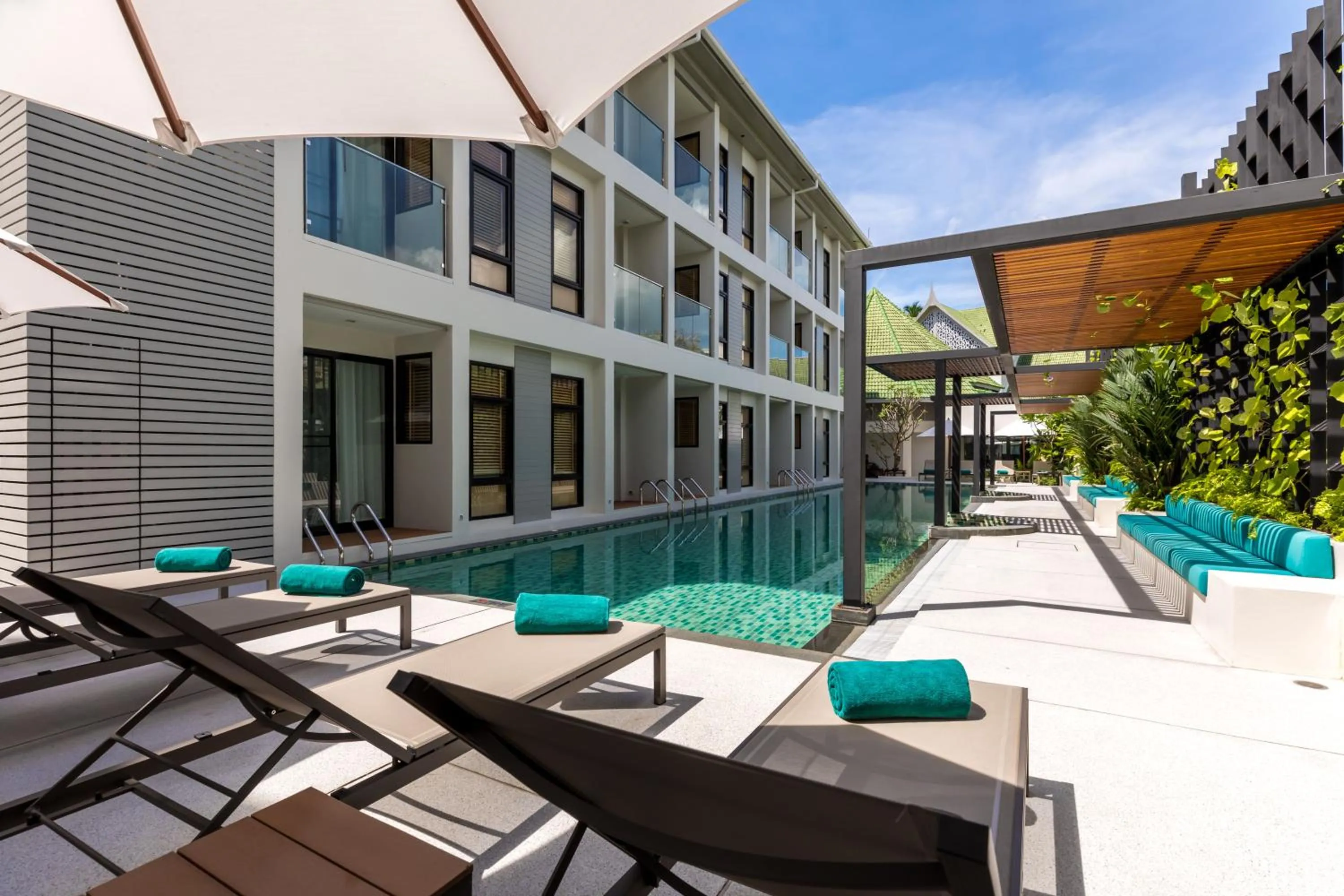 Swimming pool in OUTRIGGER Surin Beach Resort