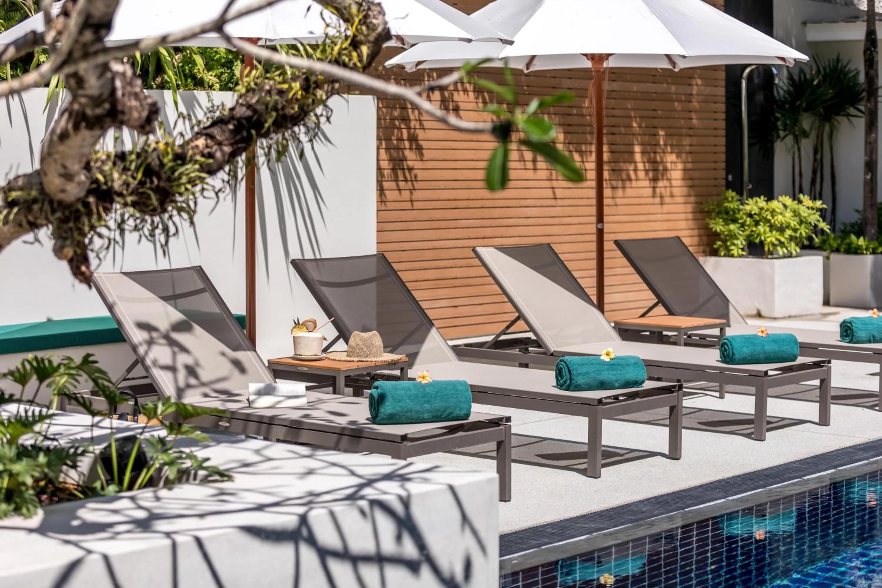 Swimming pool in OUTRIGGER Surin Beach Resort