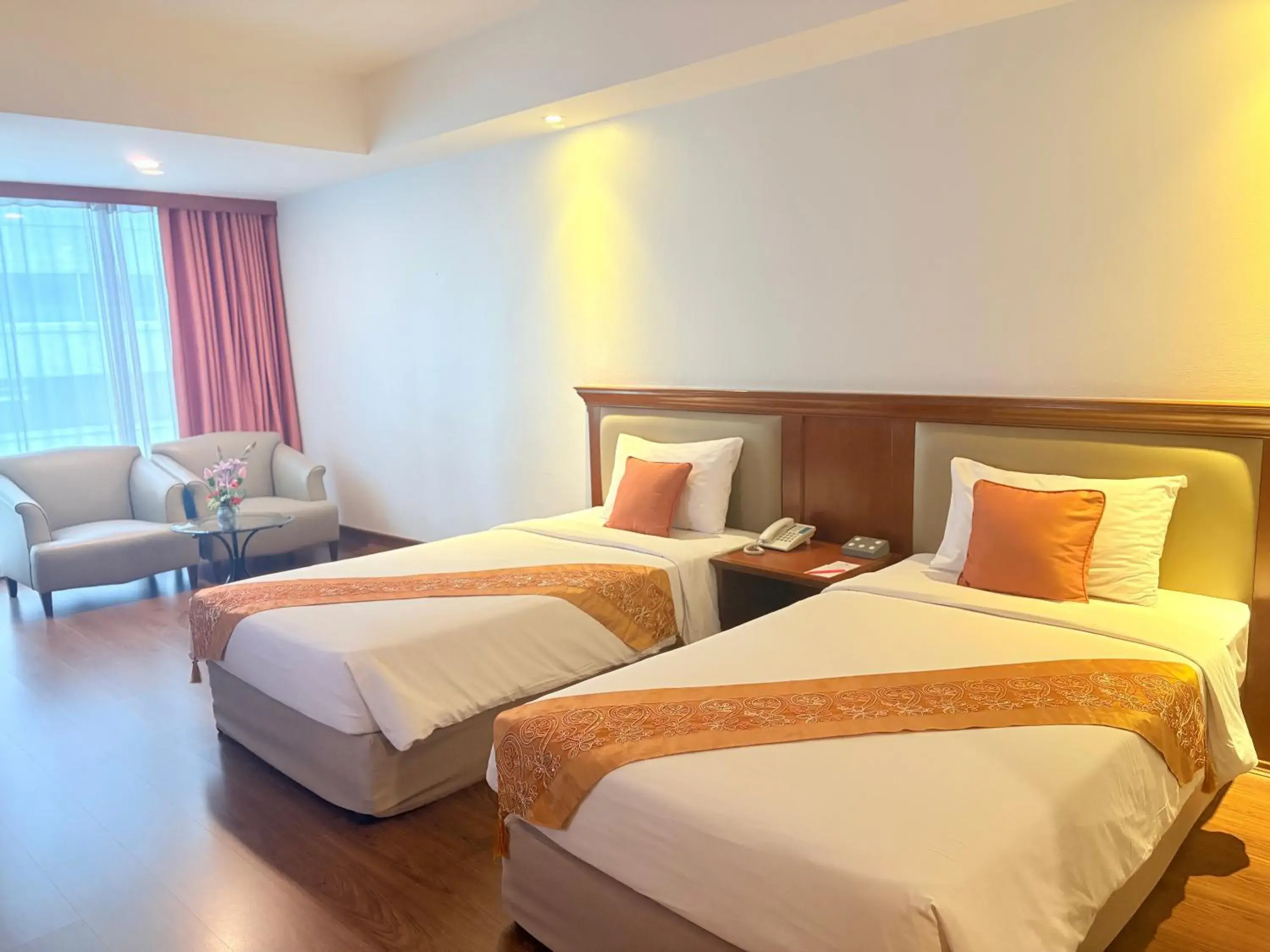 Bed in Tai Pan Hotel Bed in Tai Pan Hotel