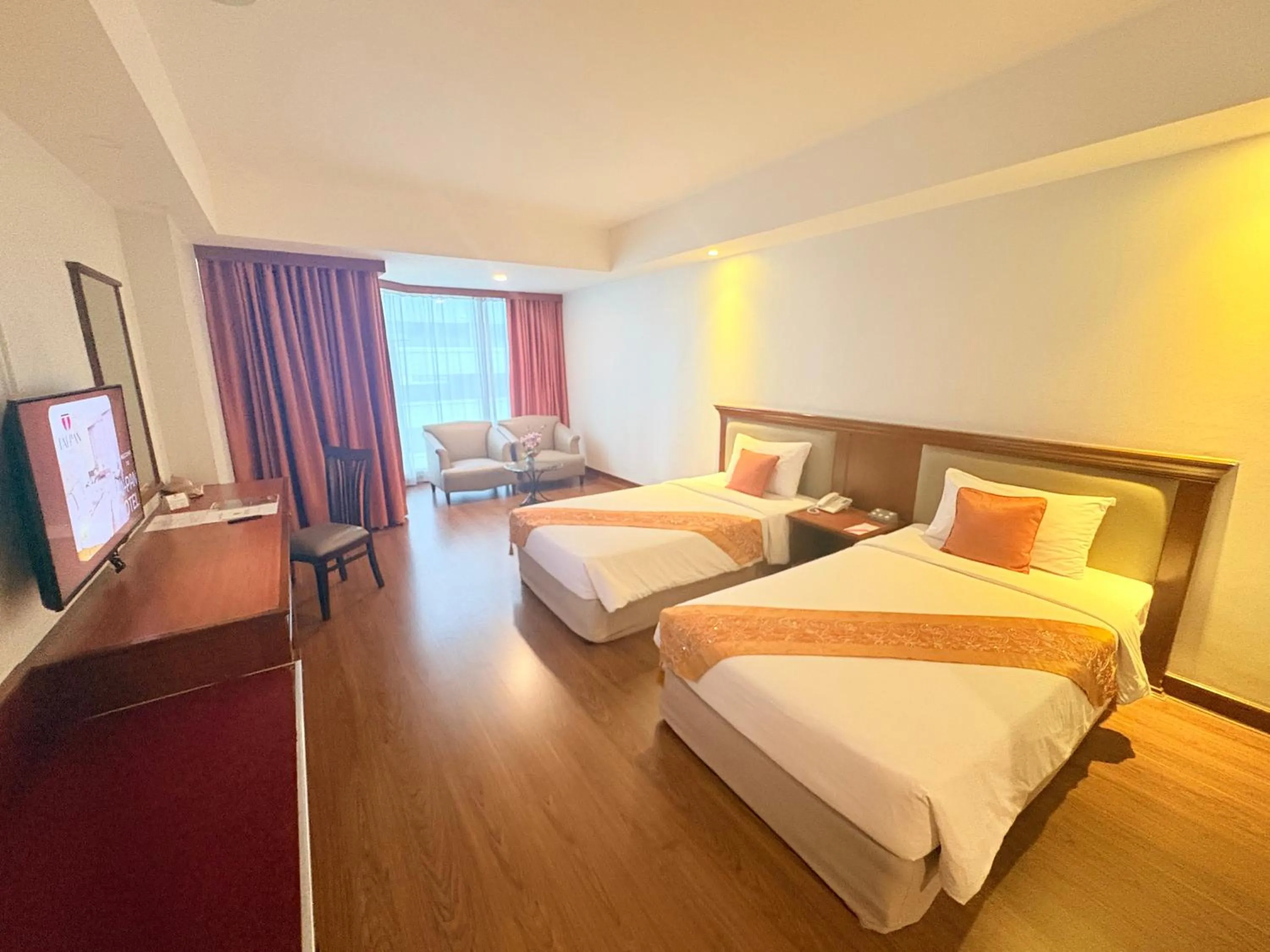 Bed in Tai Pan Hotel