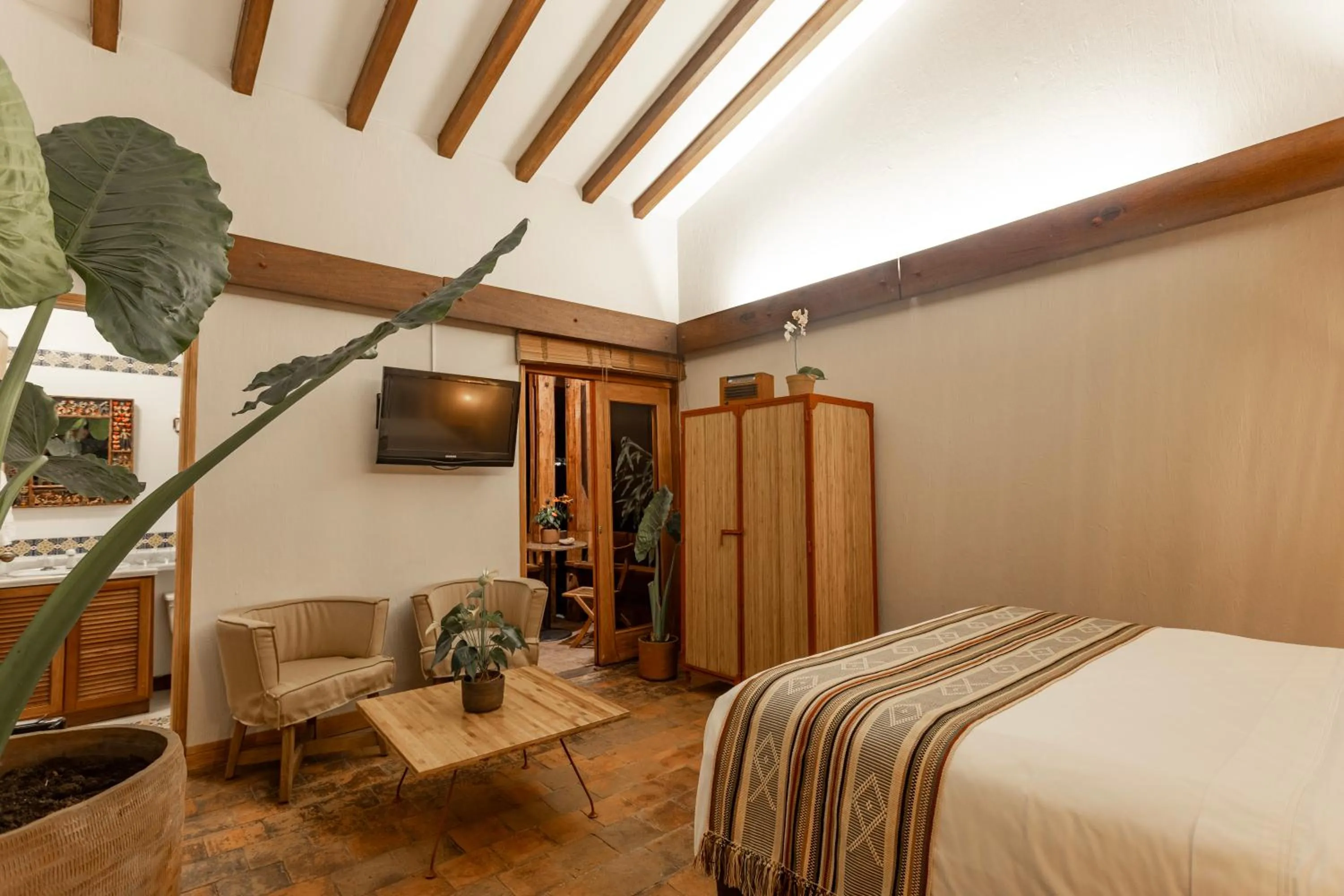 Photo of the whole room, Bed in Sazagua Hotel Boutique