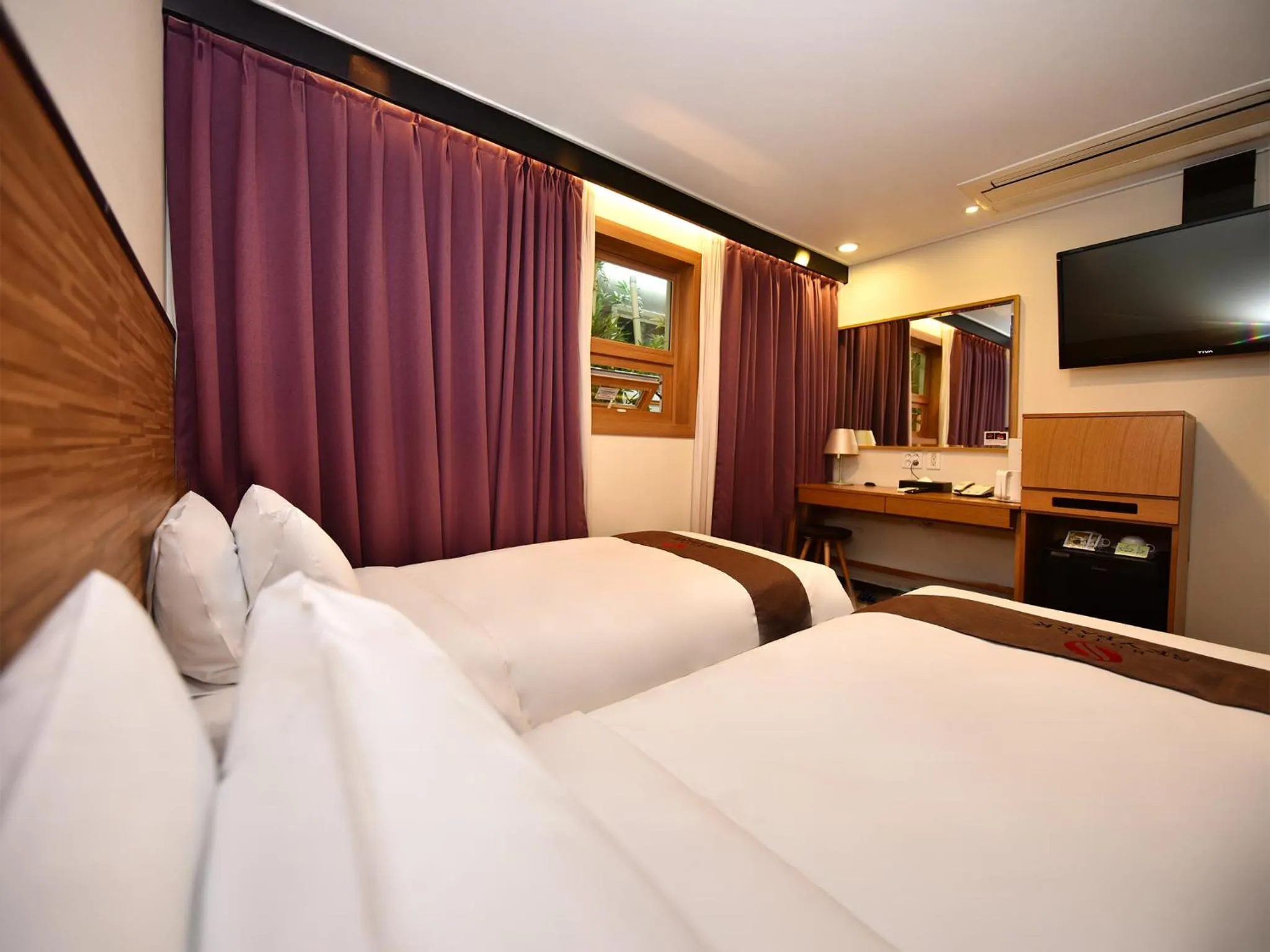 Bed in Hotel Skypark Myeongdong 1