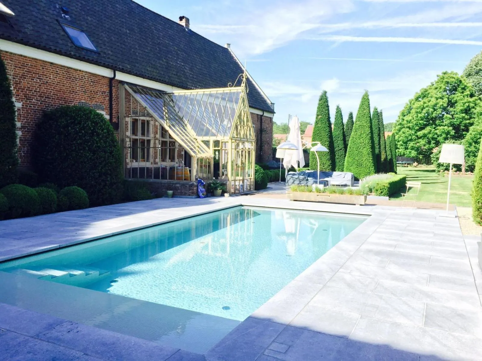 Swimming pool in Hof Van Volmersele - Luxury B&B