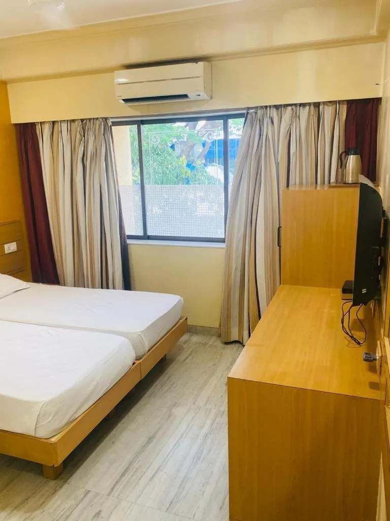 Bed in Hotel Midland