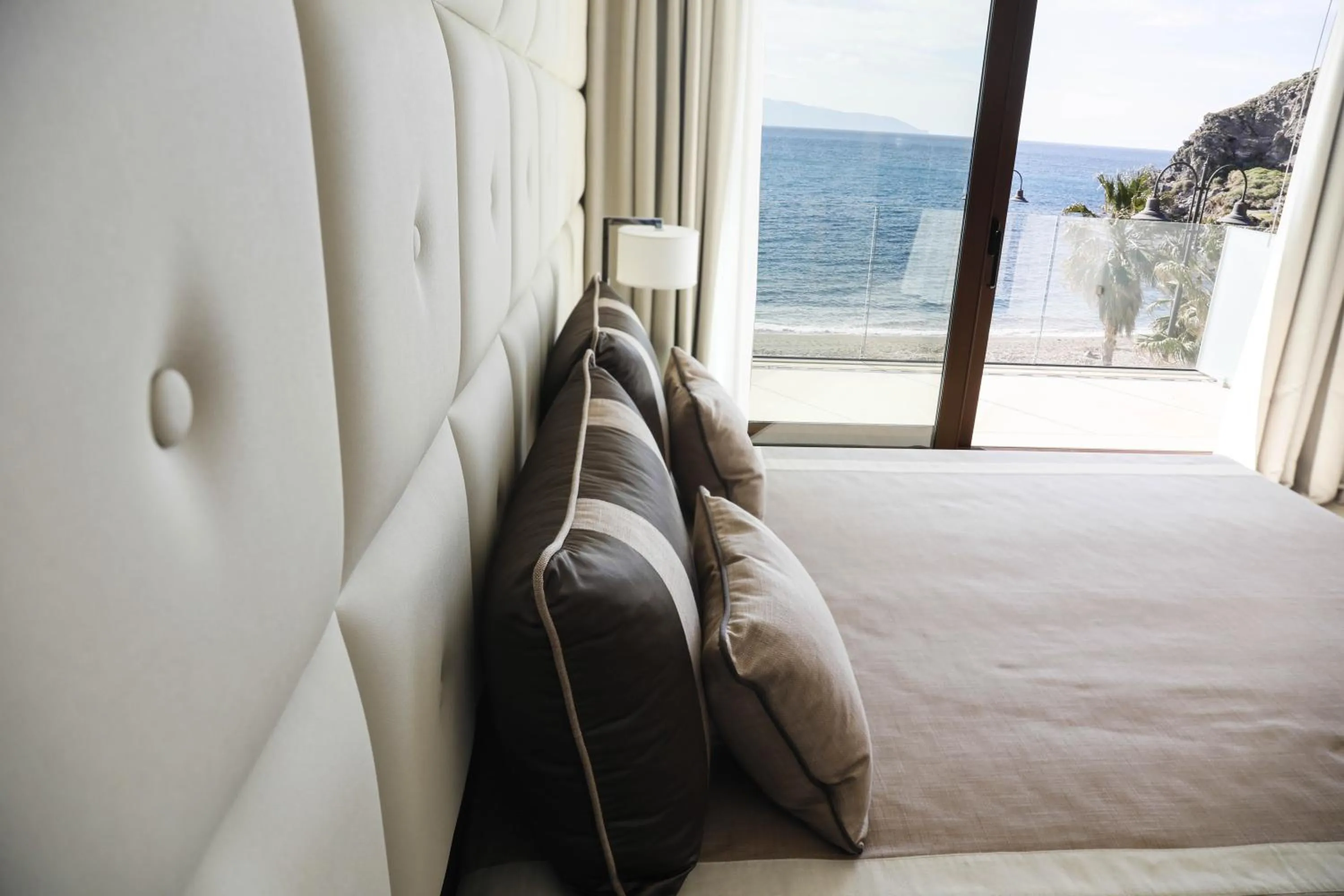 Bed in Ngonia Bay Boutique Hotel