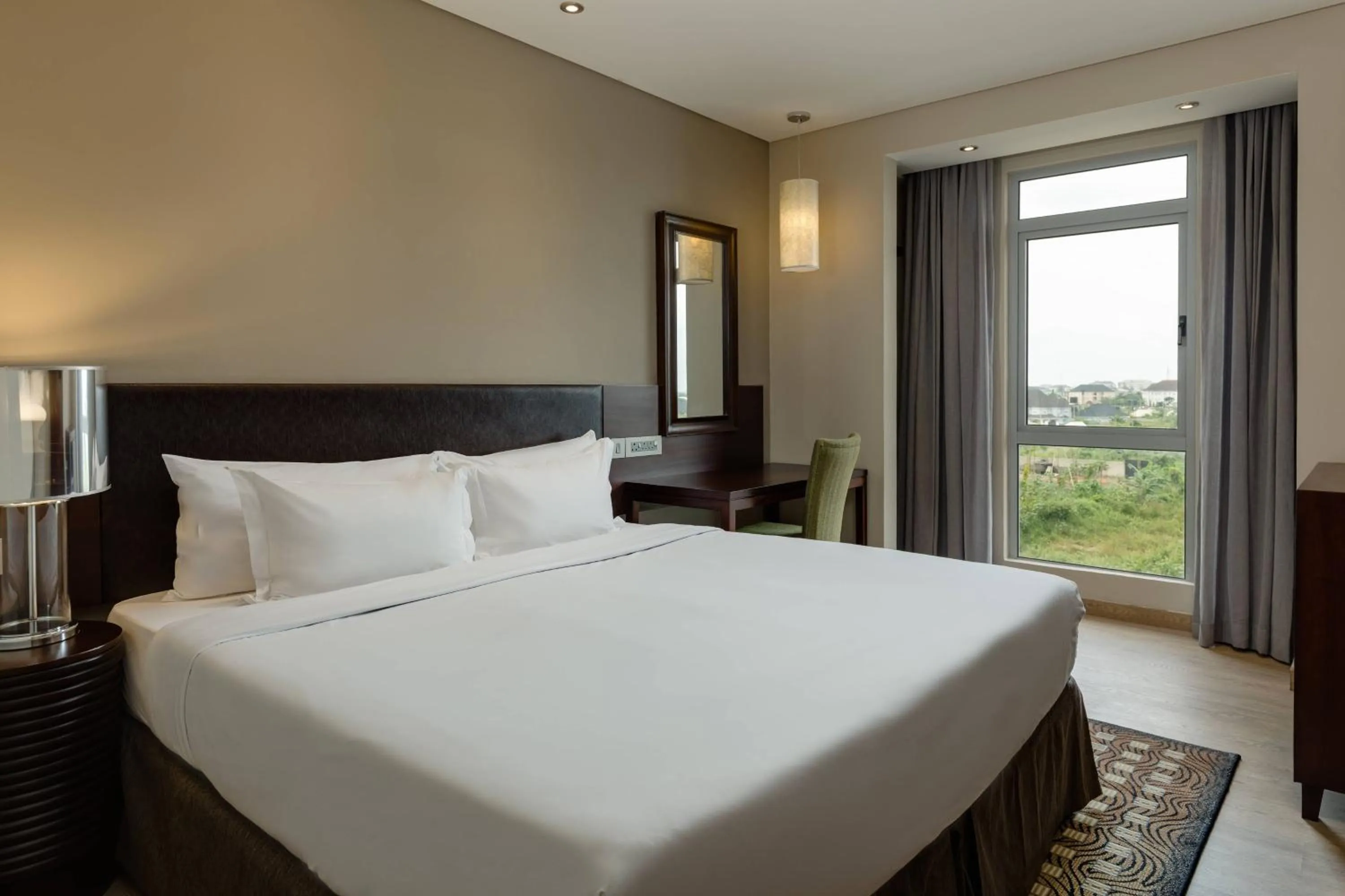 Photo of the whole room, Bed in Protea Hotel by Marriott Owerri Select