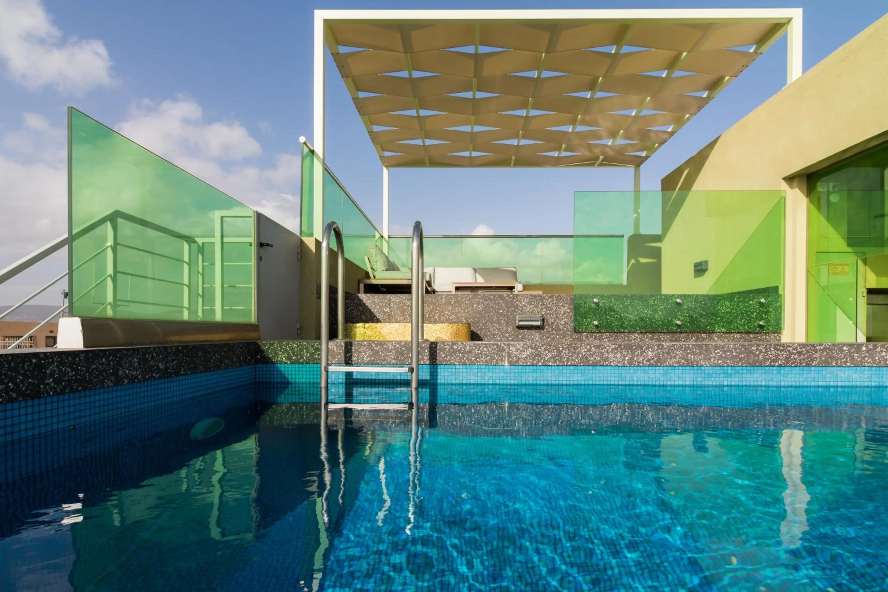 Swimming pool in Athens Mosaico Suites & Apartments