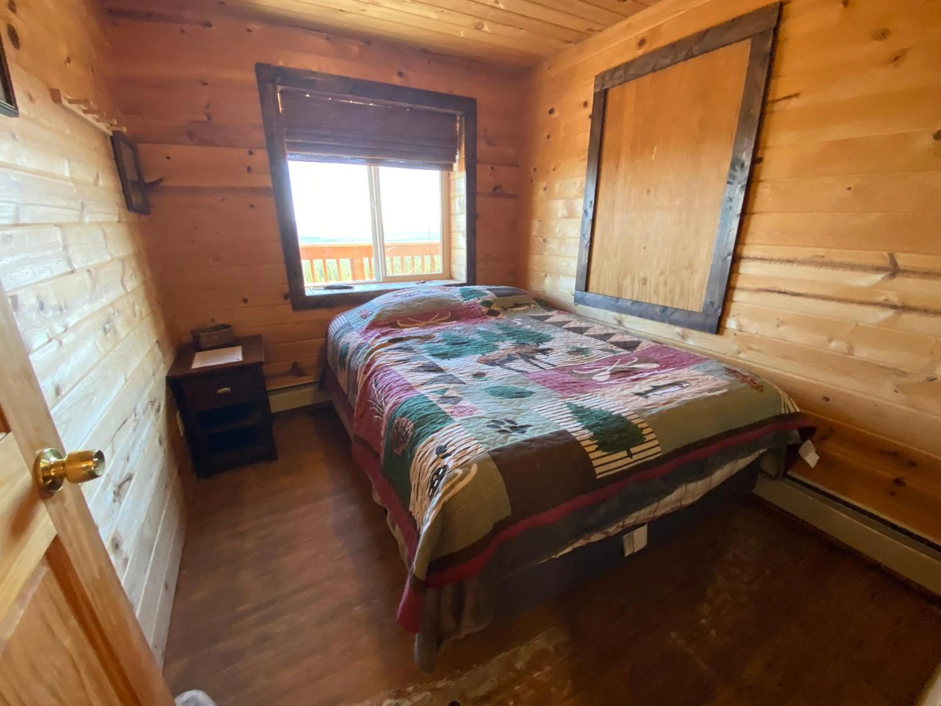 Bed in Alpine Creek Lodge