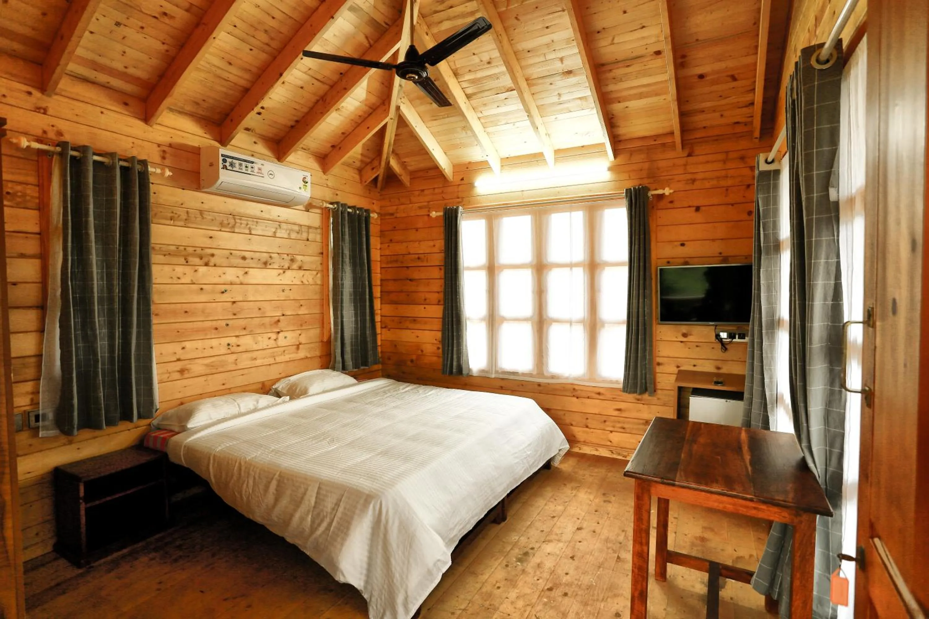 Bed in Woodgreens Heritage Resorts