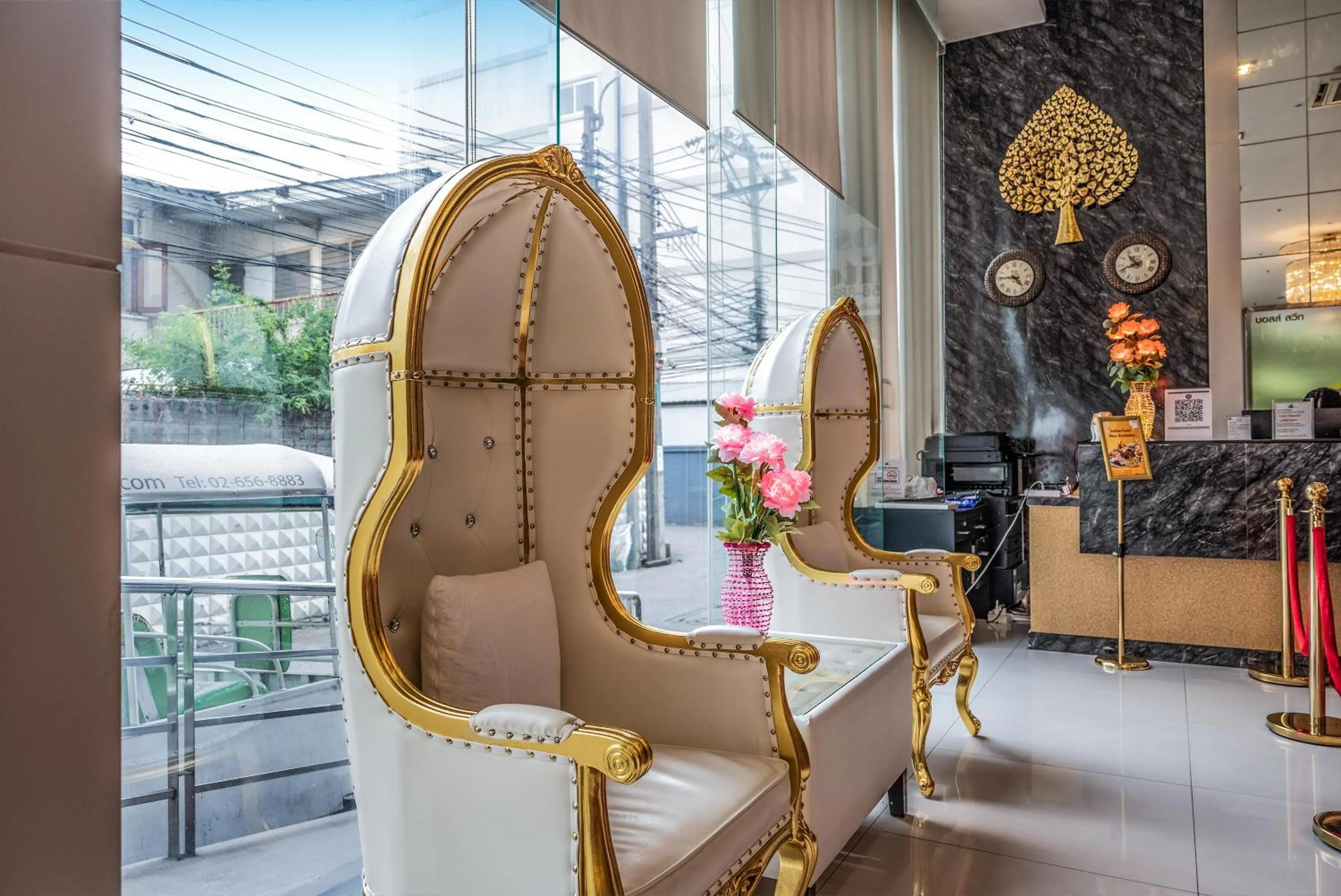 Lobby or reception in Boss Suites Nana Hotel