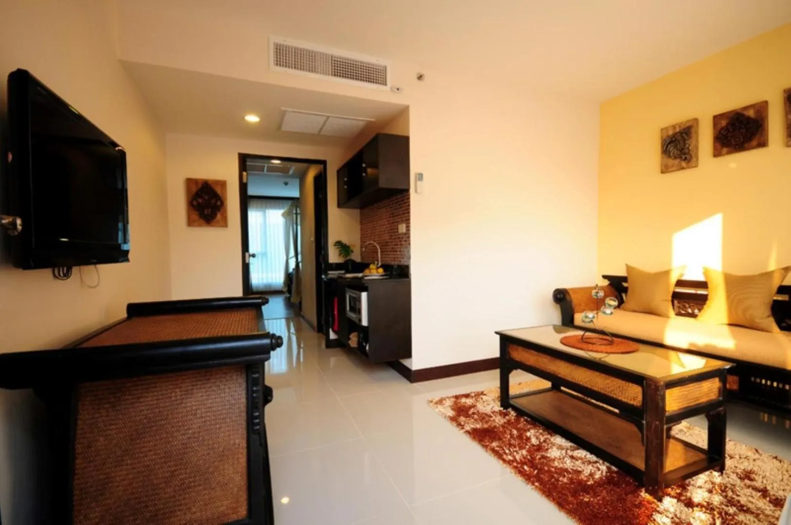 Living room in Boss Suites Nana Hotel