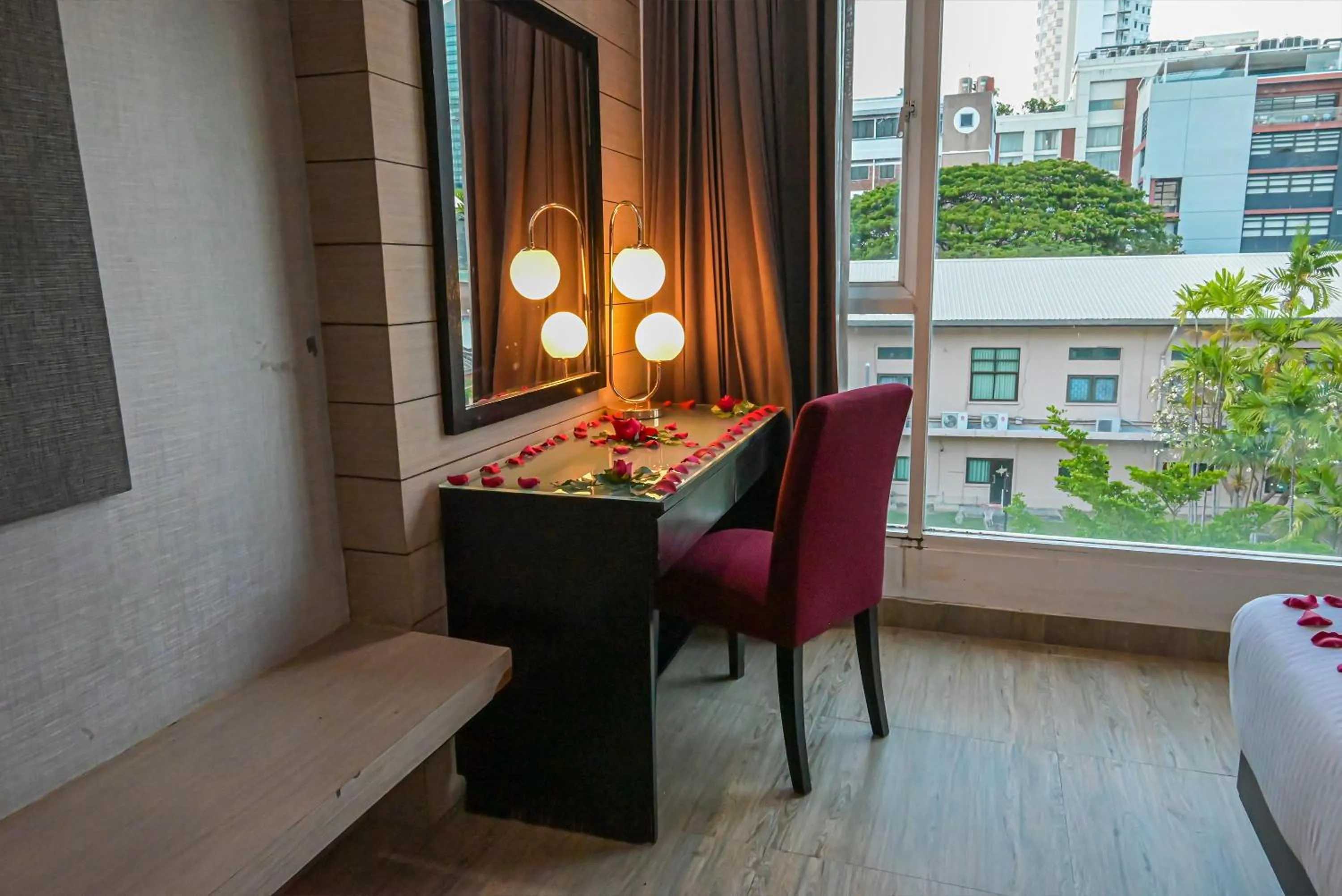 Seating area in Boss Suites Nana Hotel