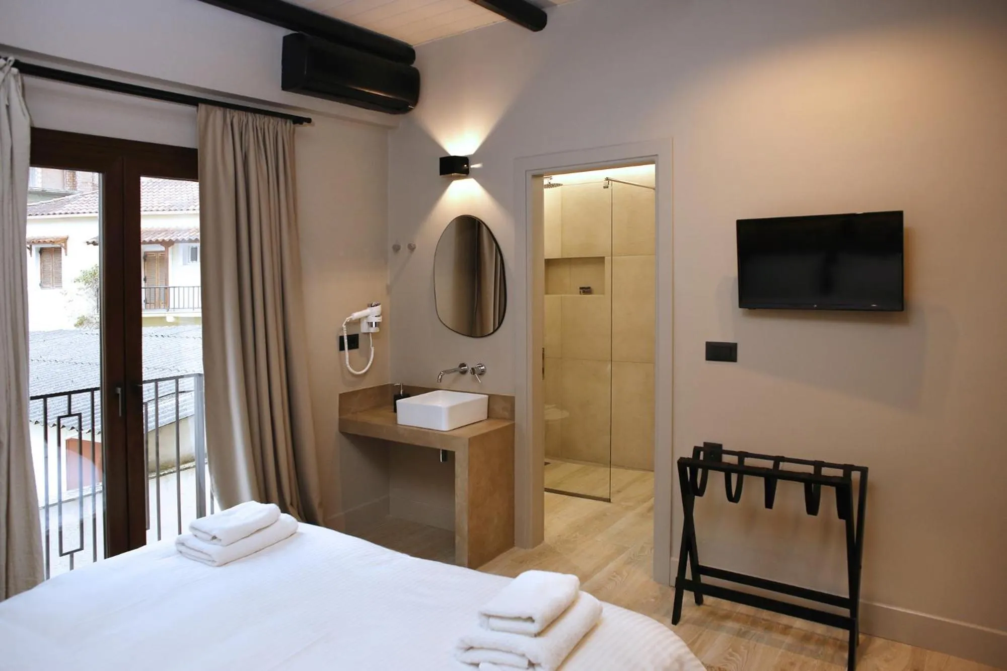 Bed in Anesis Hotel