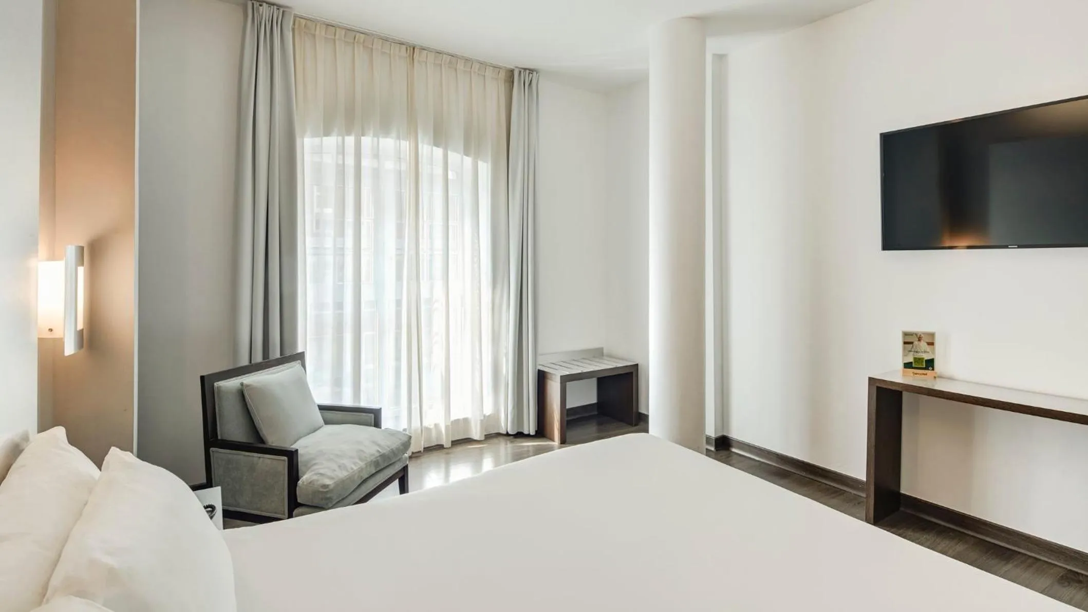 Photo of the whole room, Bed in Sercotel Coliseo