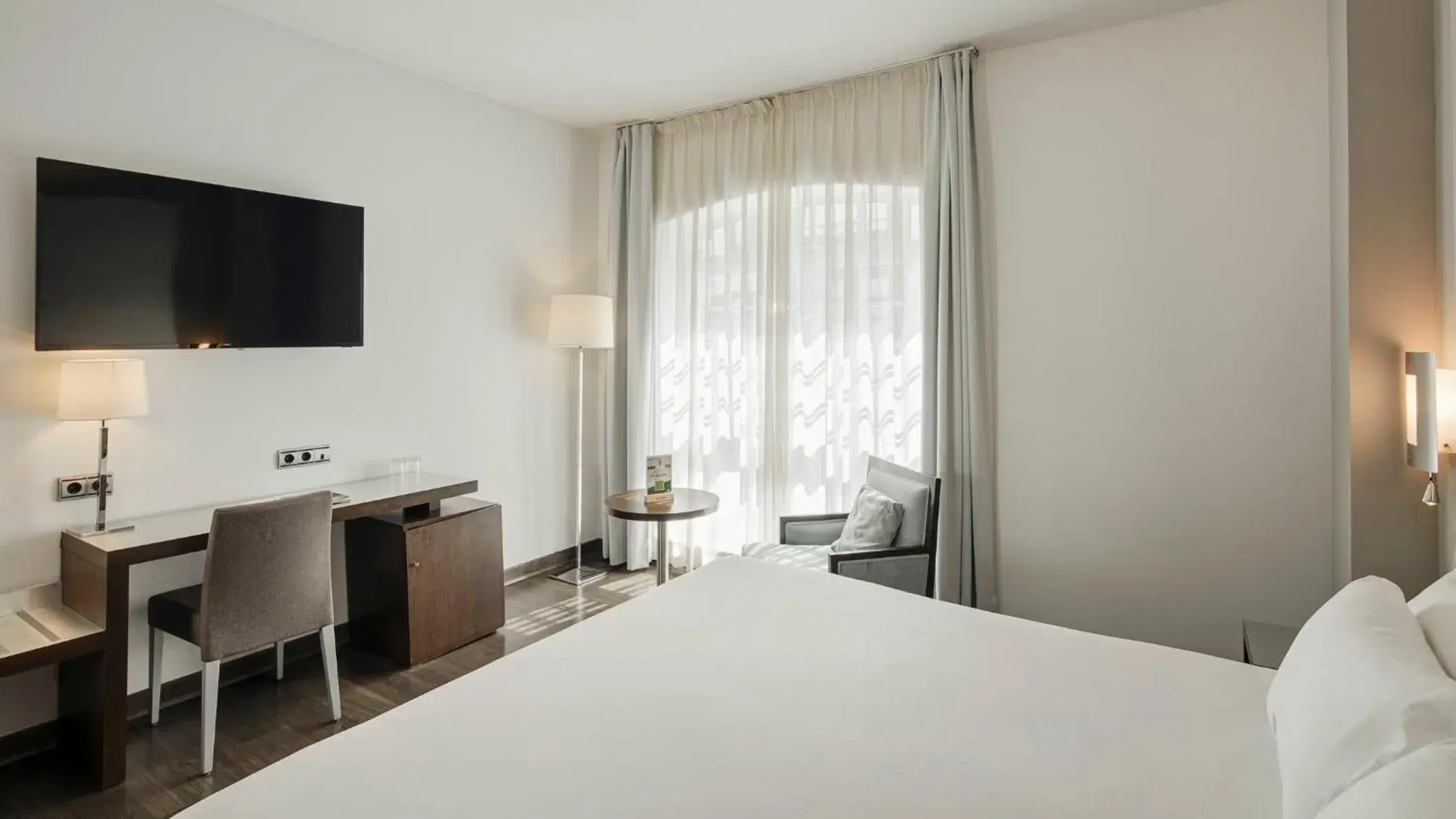 Photo of the whole room, Bed in Sercotel Coliseo Photo of the whole room, Bed in Sercotel Coliseo