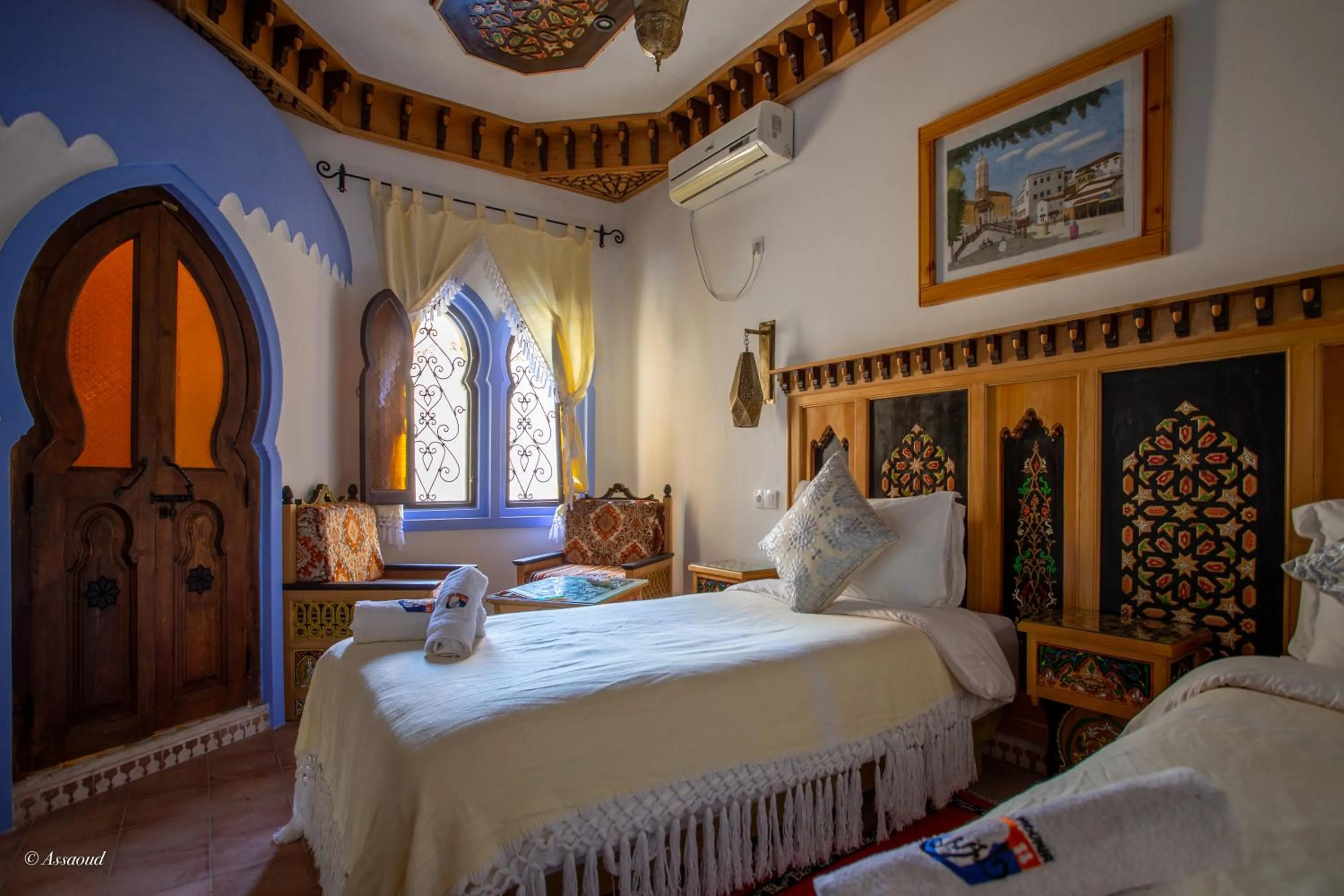 Bed in Hotel Dar Mounir