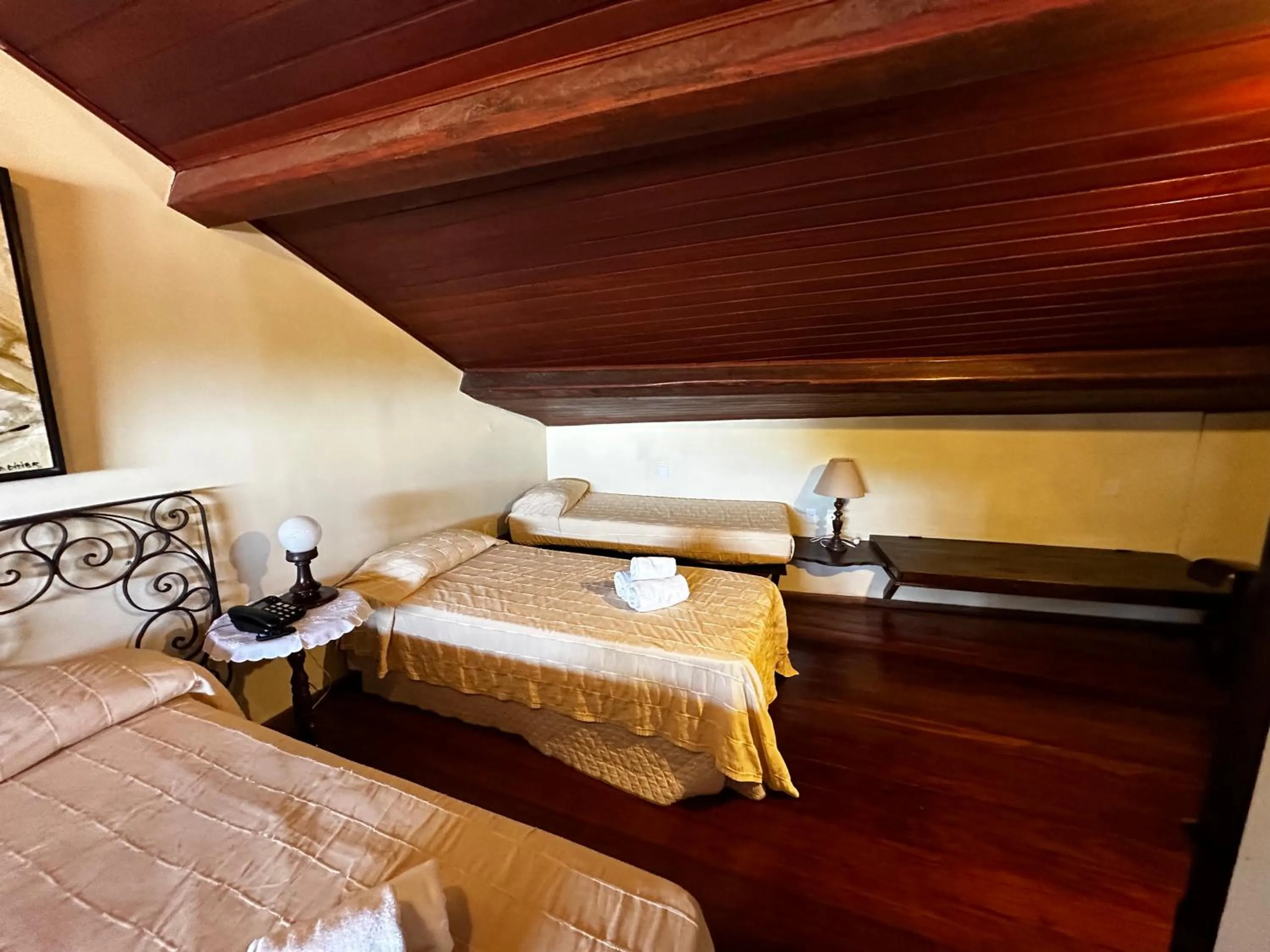 Bed in Pousada dos Quatro Cantos