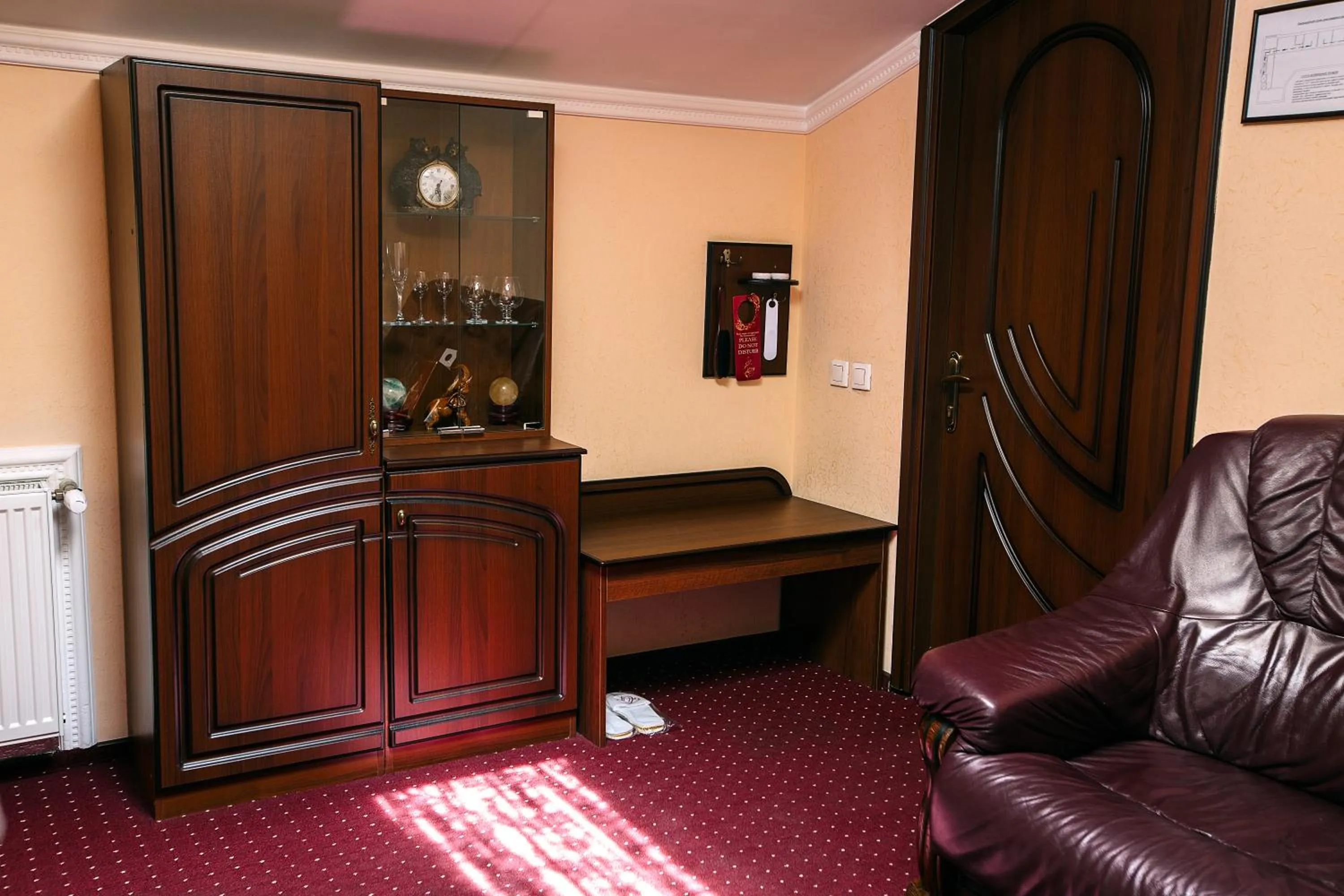 Communal lounge/ TV room in Edem Hotel Lviv