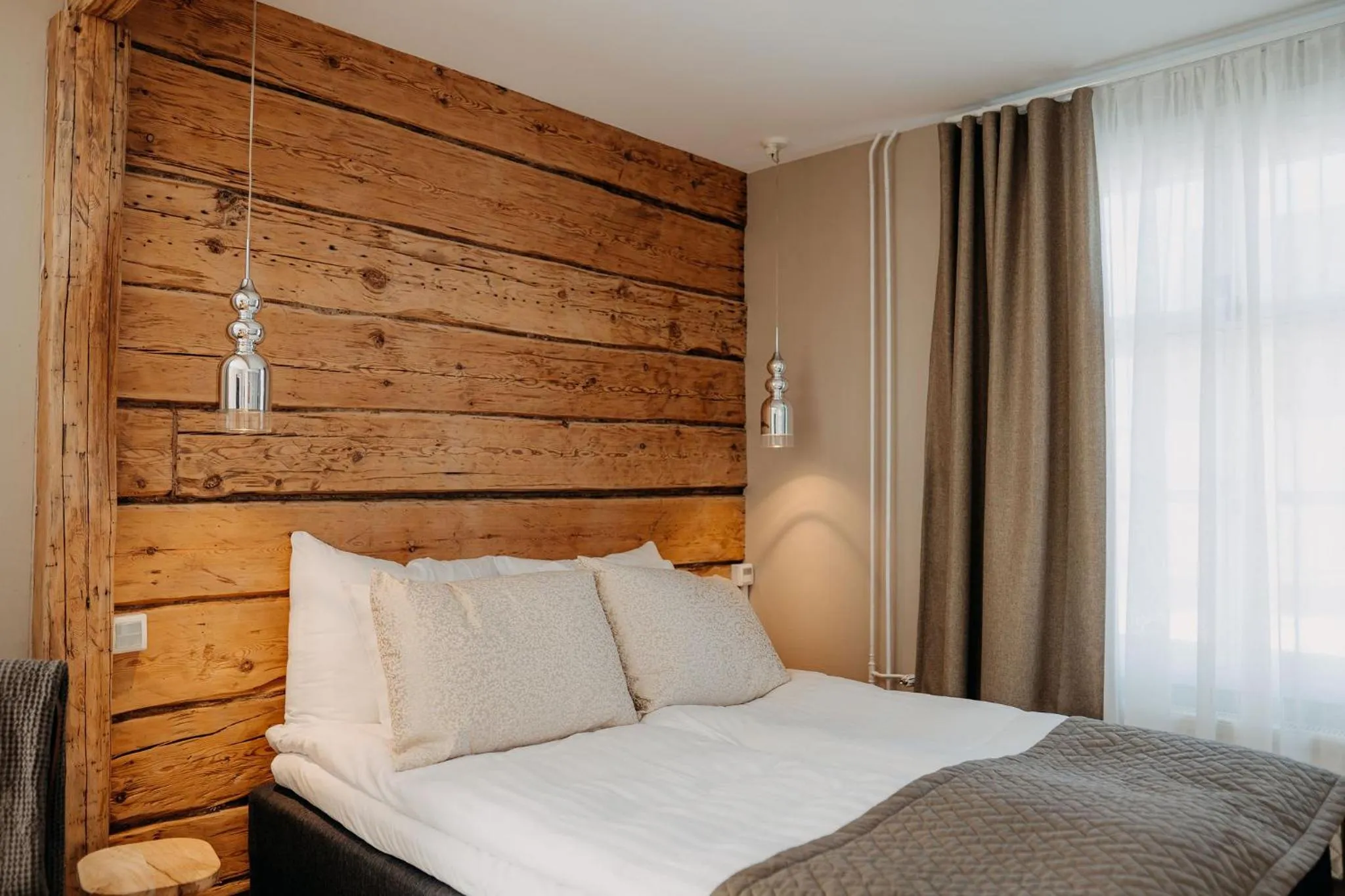 Bed in Lillan Hotel & Kök