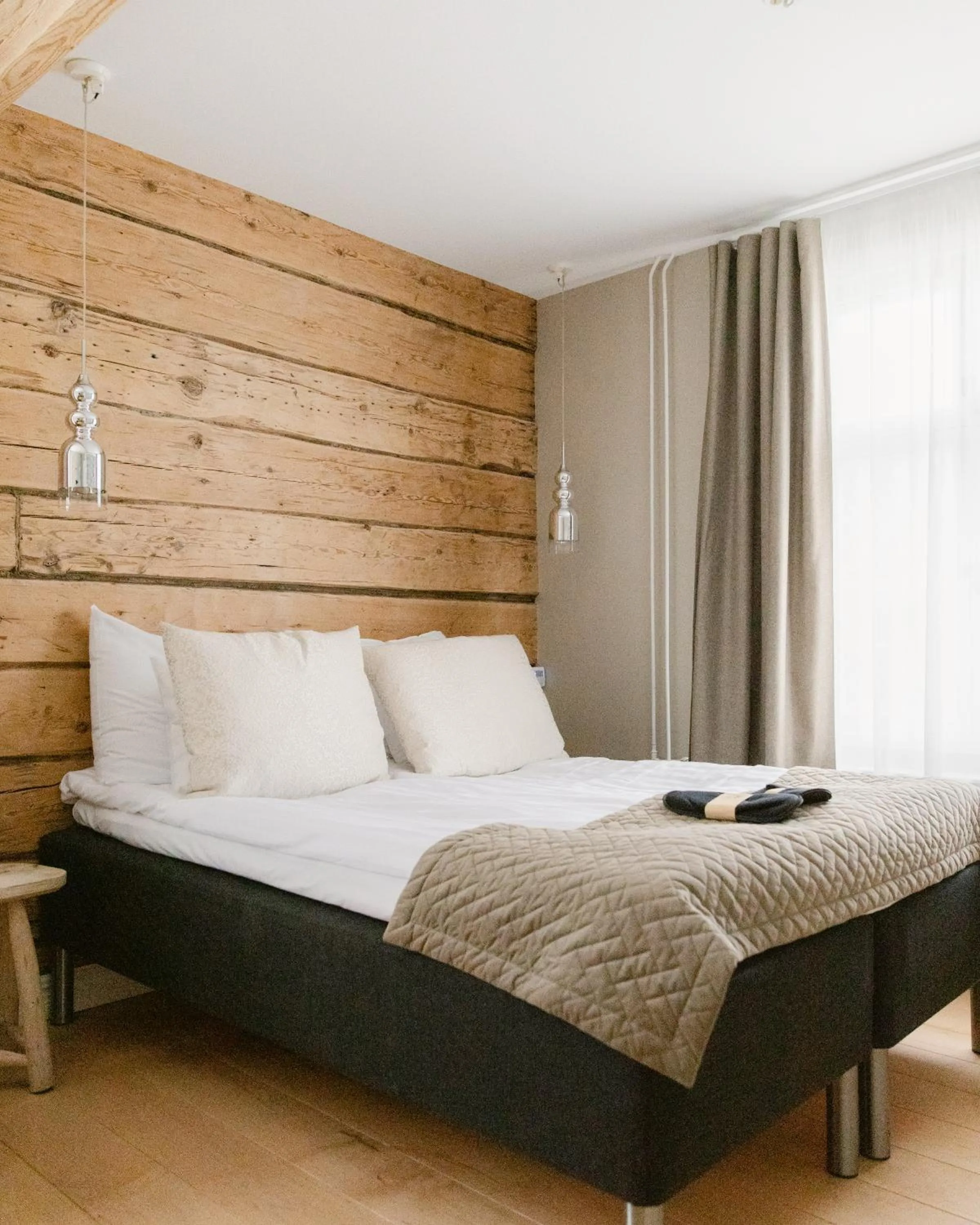 Bed in Lillan Hotel & Kök