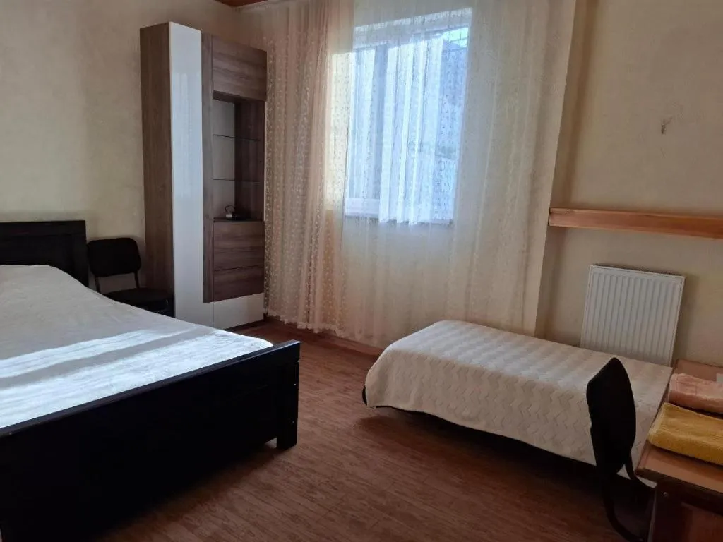 Bed in Safari House Tbilisi Wine & Family Hotel