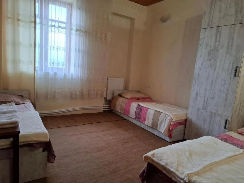 Bed in Safari House Tbilisi Wine & Family Hotel