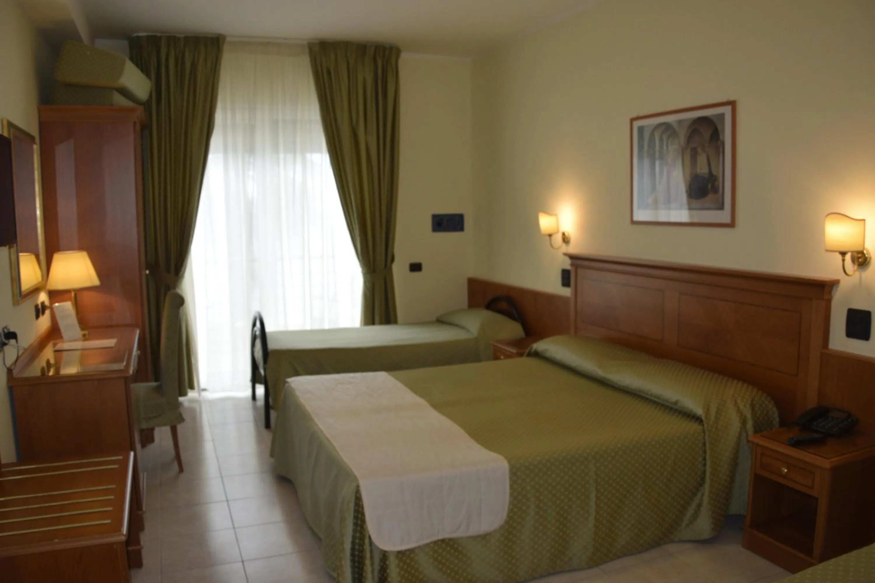 Bed in Grand Hotel Victoria