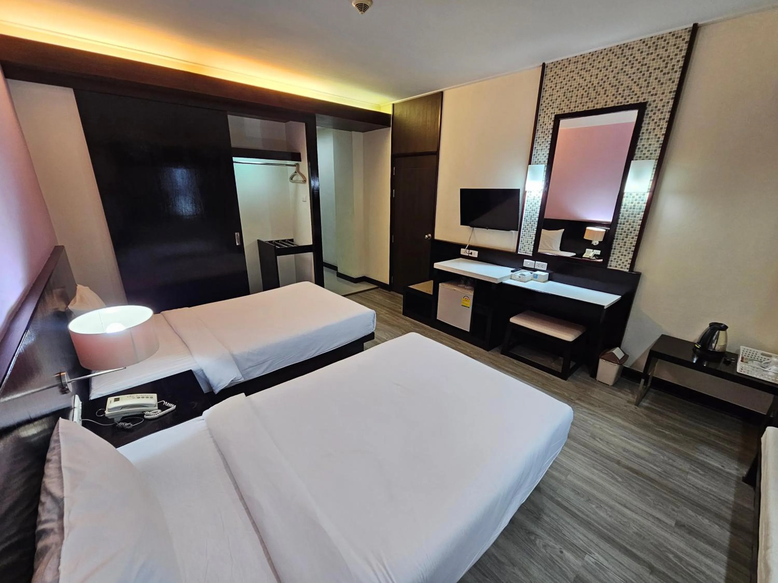 Bed in โรงแรม ซิตี้พาร์ค โคราช City Park Hotel