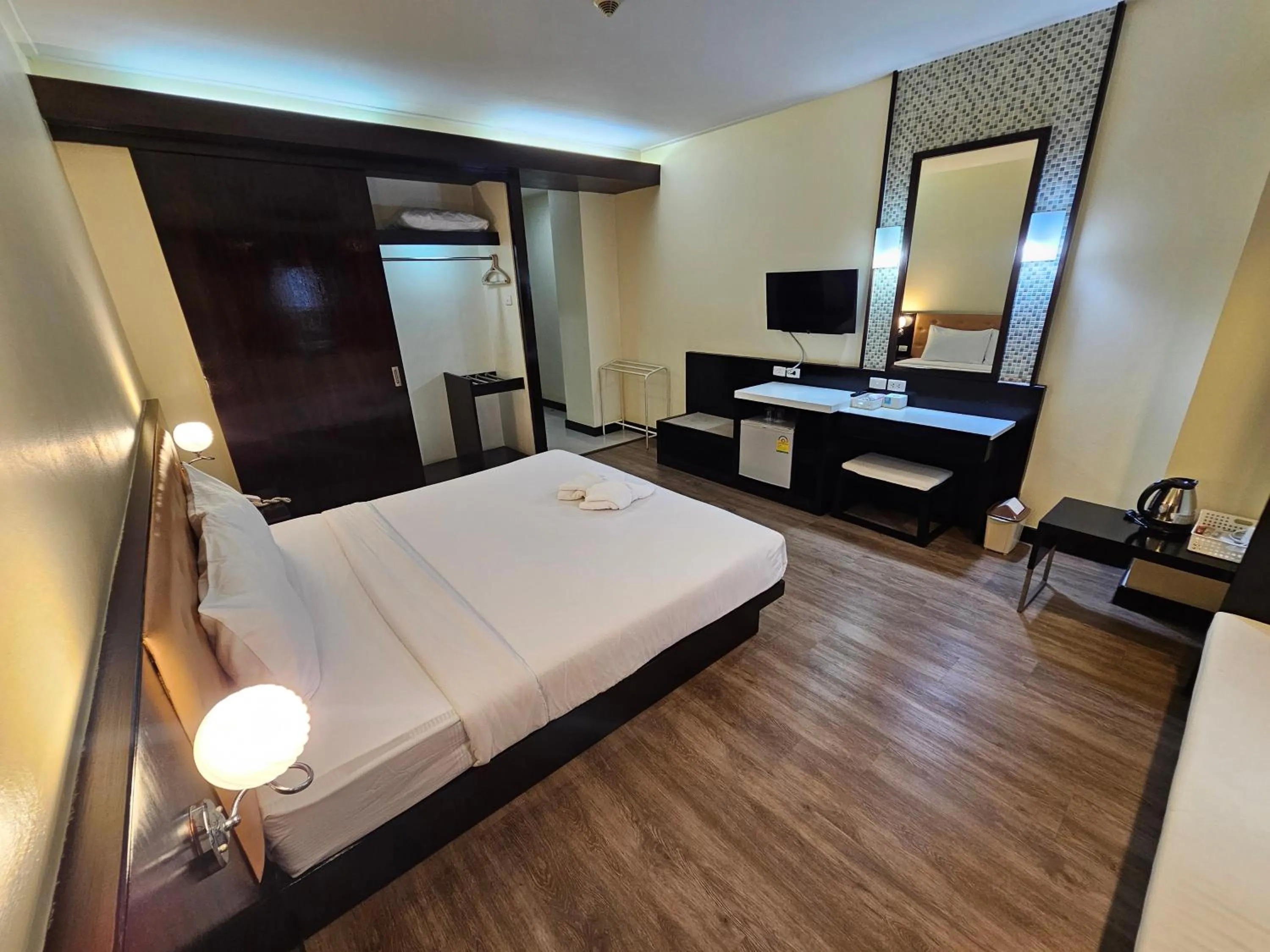 Bed in โรงแรม ซิตี้พาร์ค โคราช City Park Hotel