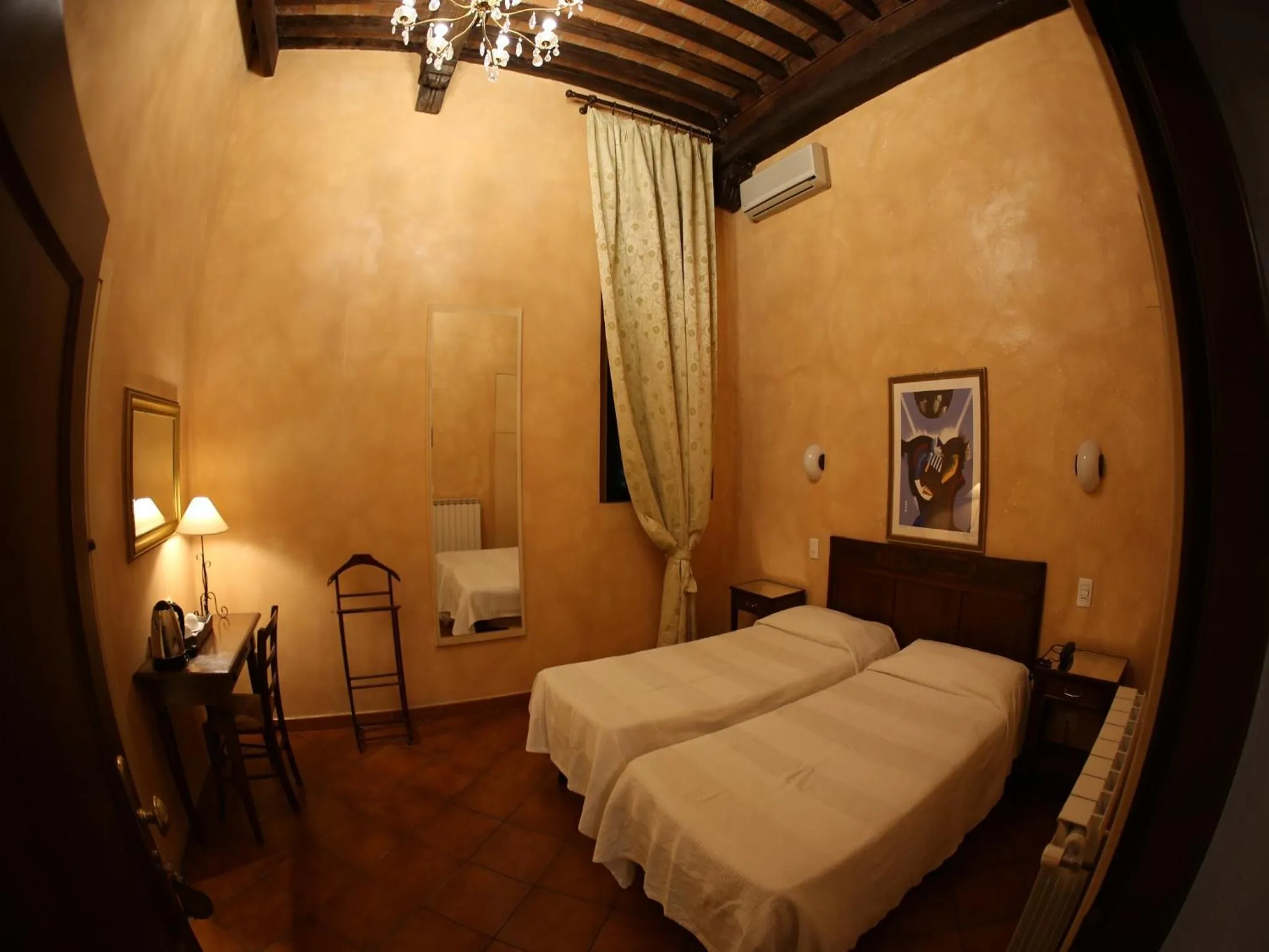 Photo of the whole room, Bed in Hotel Italia Cortona