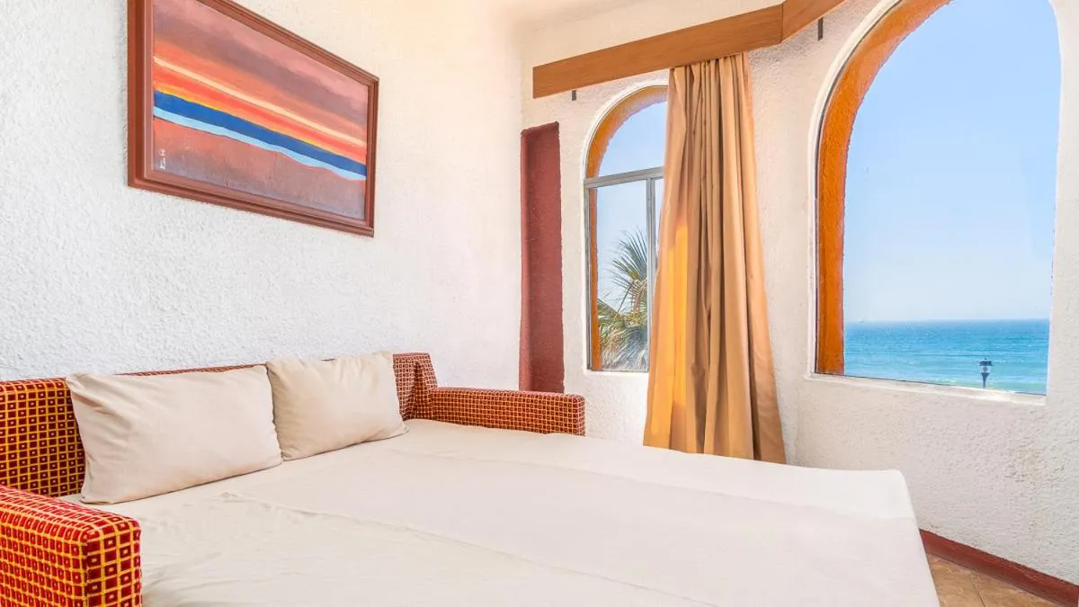 Bed in Puerto Nuevo Baja Hotel & Villas