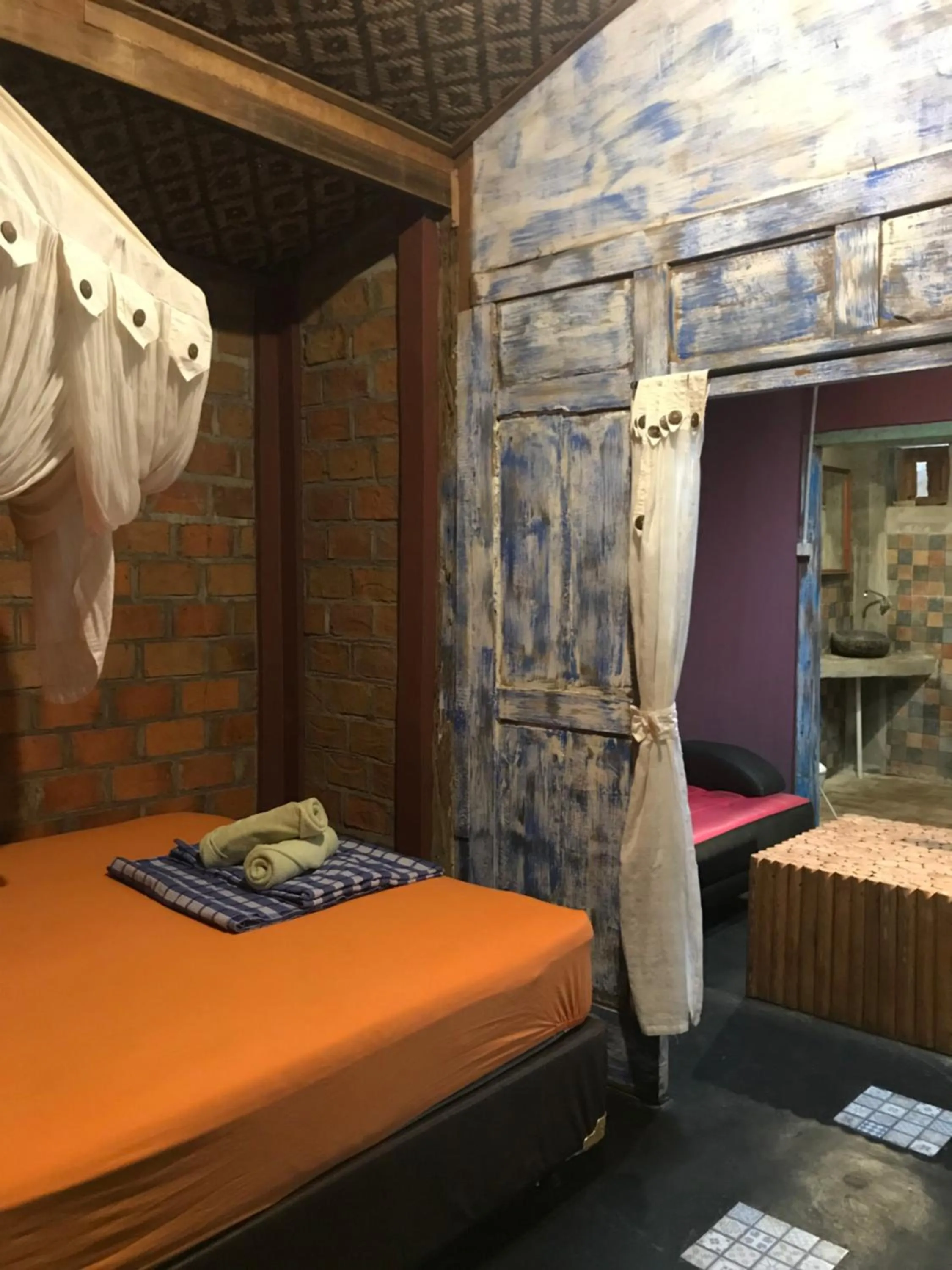 Bed in Arjuna Garden Homestay