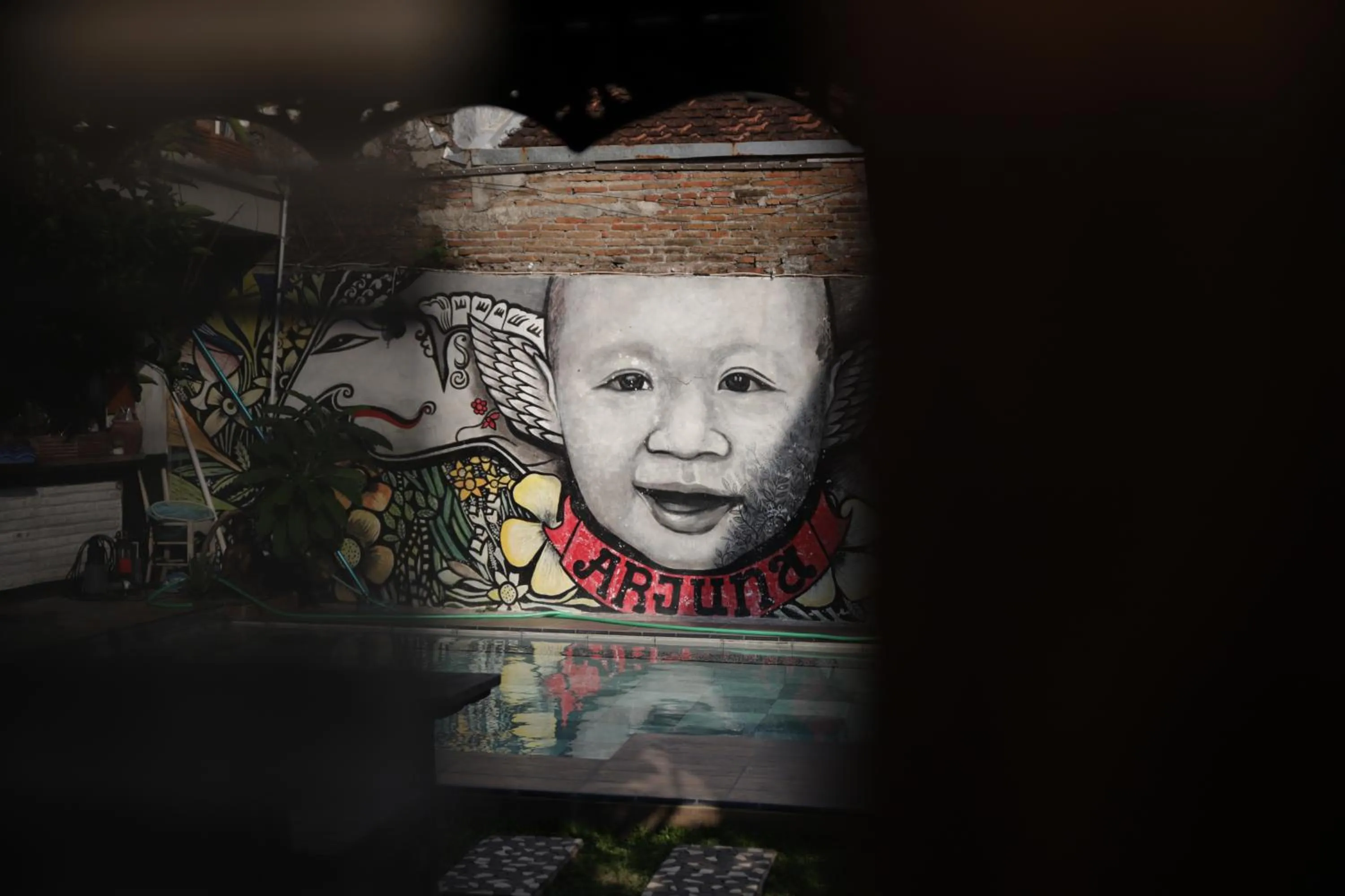 Property logo or sign in Arjuna Garden Homestay