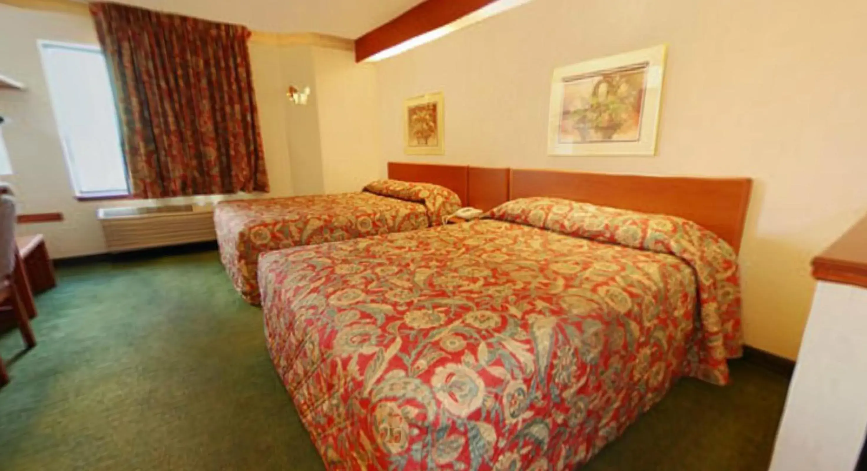 Queen Suite with Two Queen Beds in Syracuse Inn and Suites Queen Suite with Two Queen Beds in Syracuse Inn and Suites