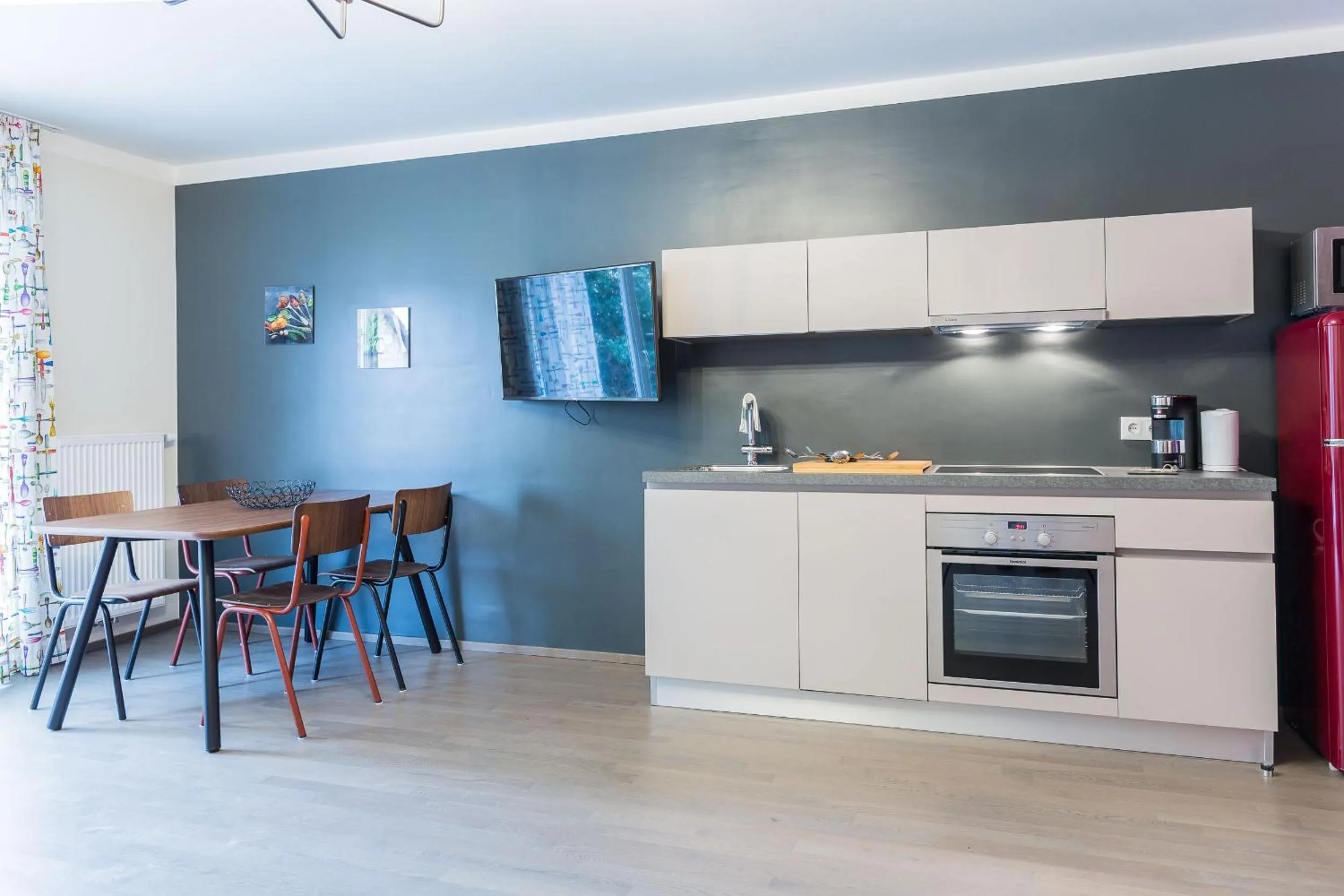 Kitchen or kitchenette in HOMEBOUND APARTMENTS Salzburg City II - contactless check-in