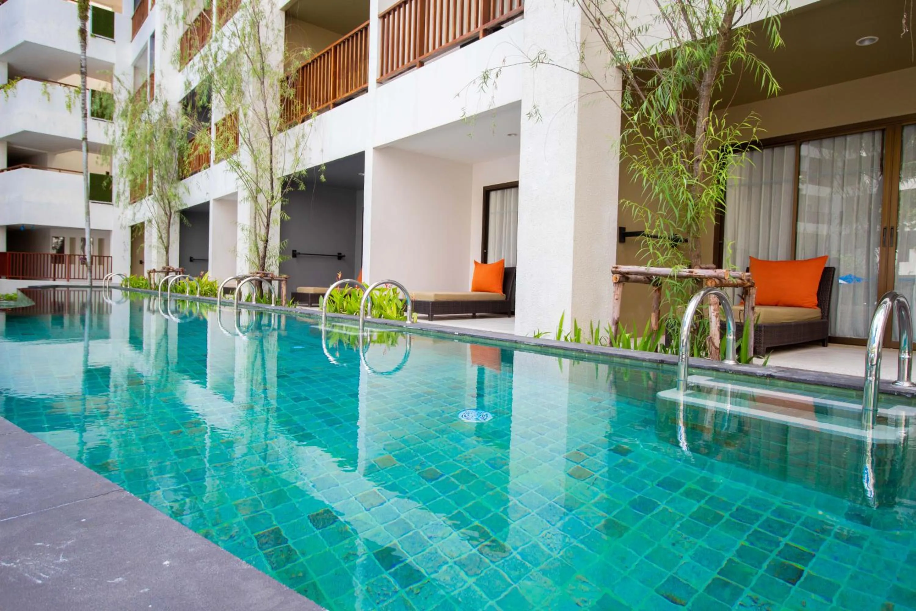 Pool view in Deevana Plaza Phuket - SHA Extra Plus