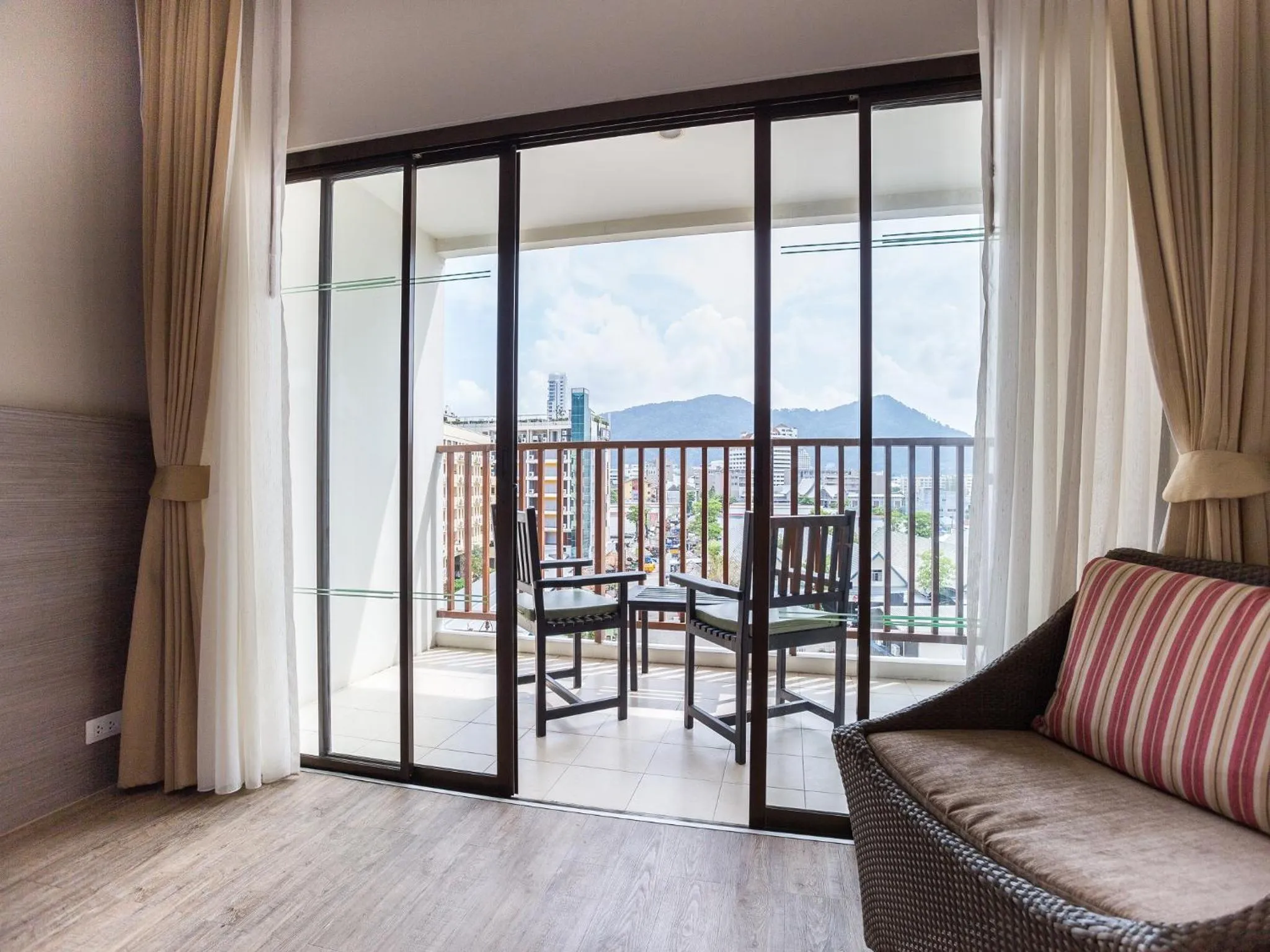 Seating area in Deevana Plaza Phuket - SHA Extra Plus