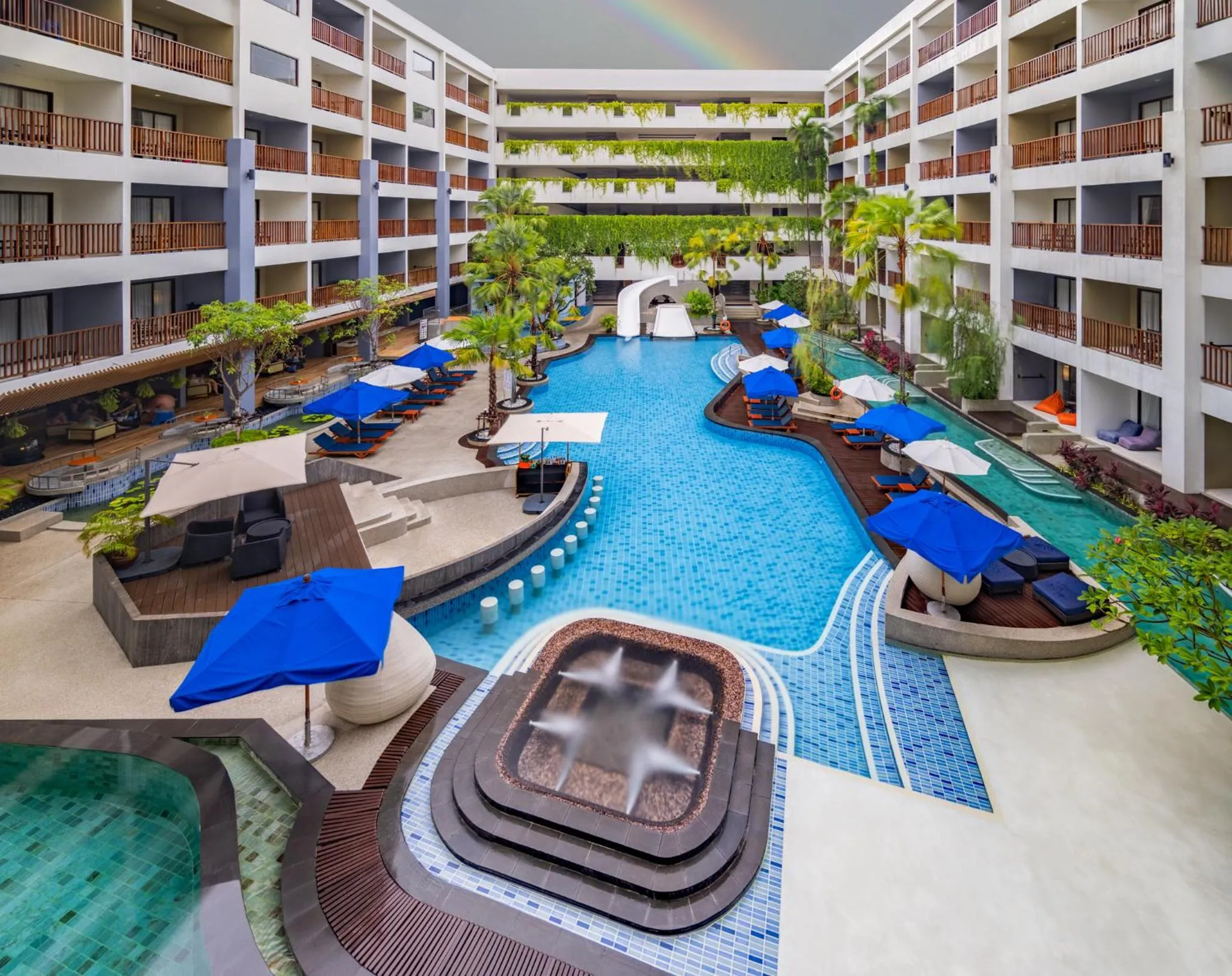 Swimming pool in Deevana Plaza Phuket - SHA Extra Plus