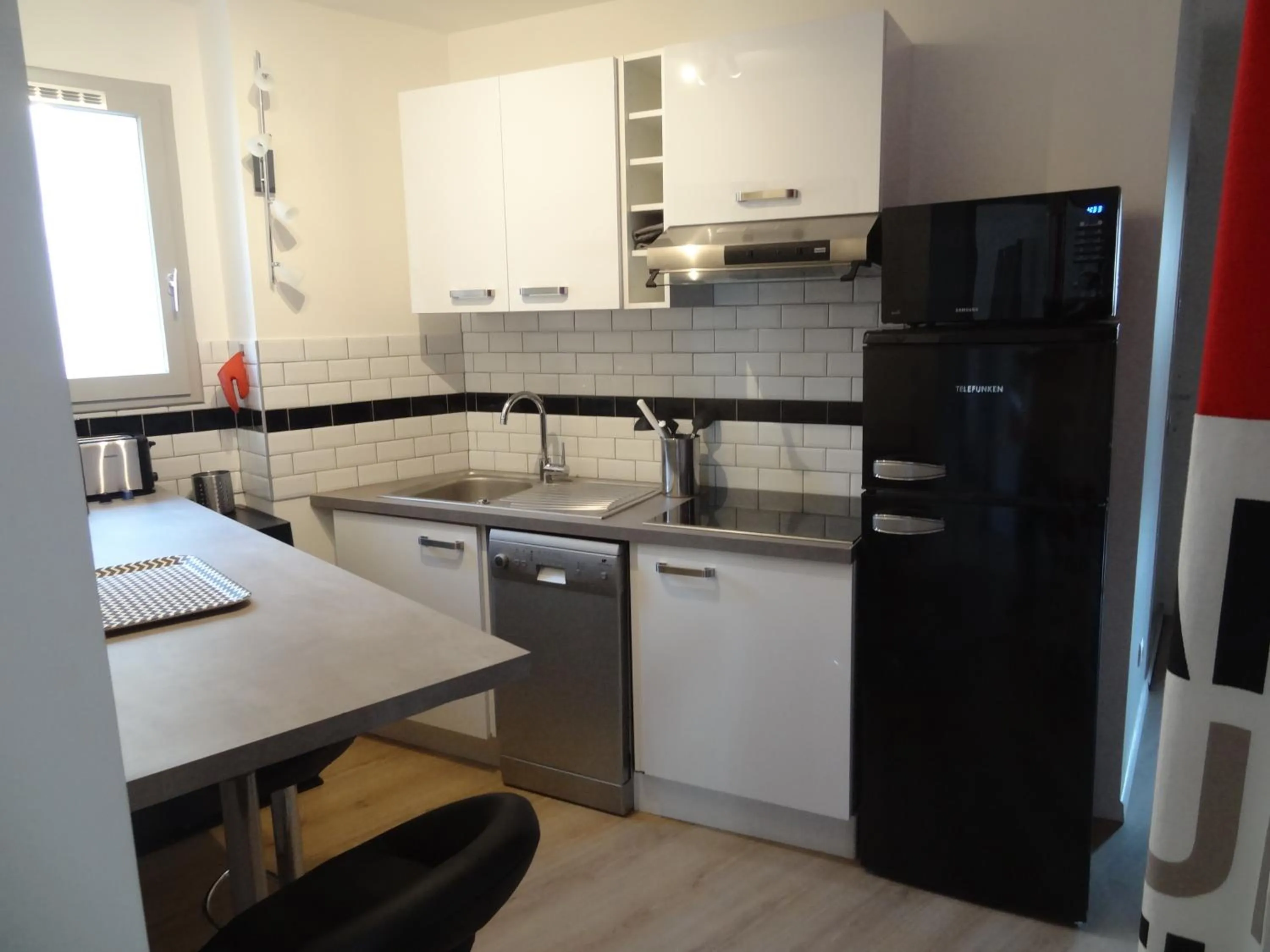 Kitchen or kitchenette in Appartement HEMINGWAY