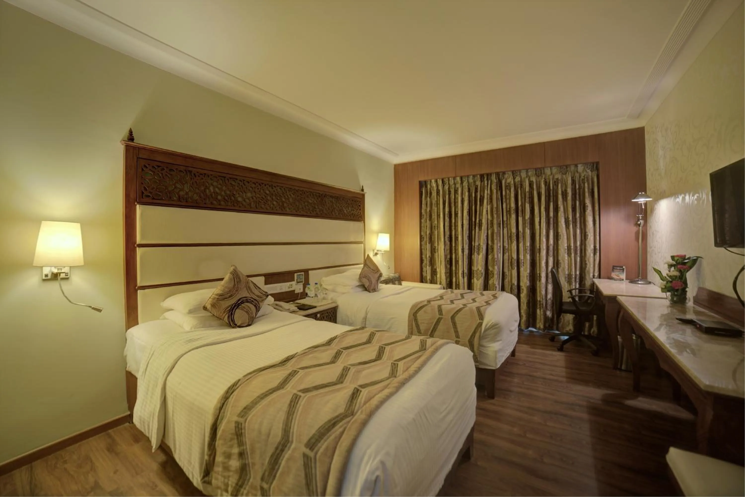 Bed in Goldfinch Hotel Bangalore