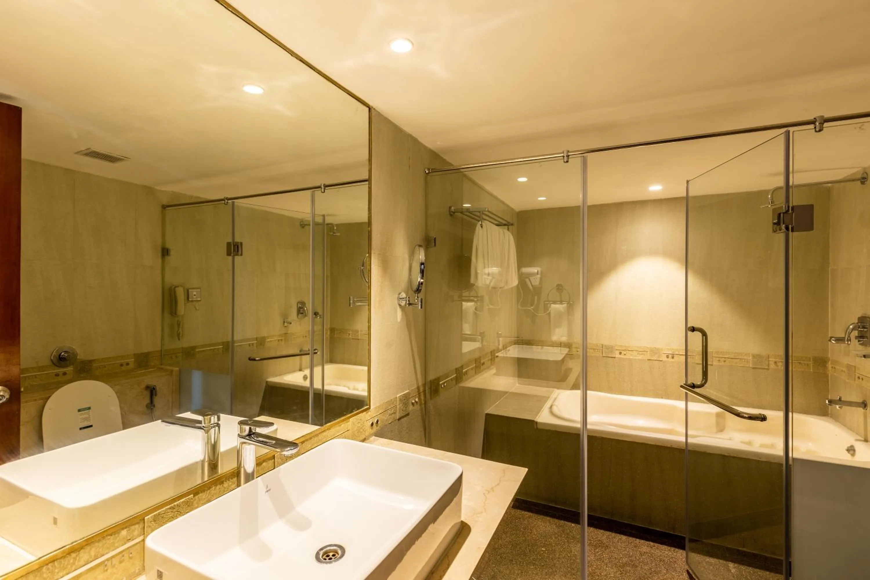 Bathroom in Citadel Sarovar Portico Bengaluru