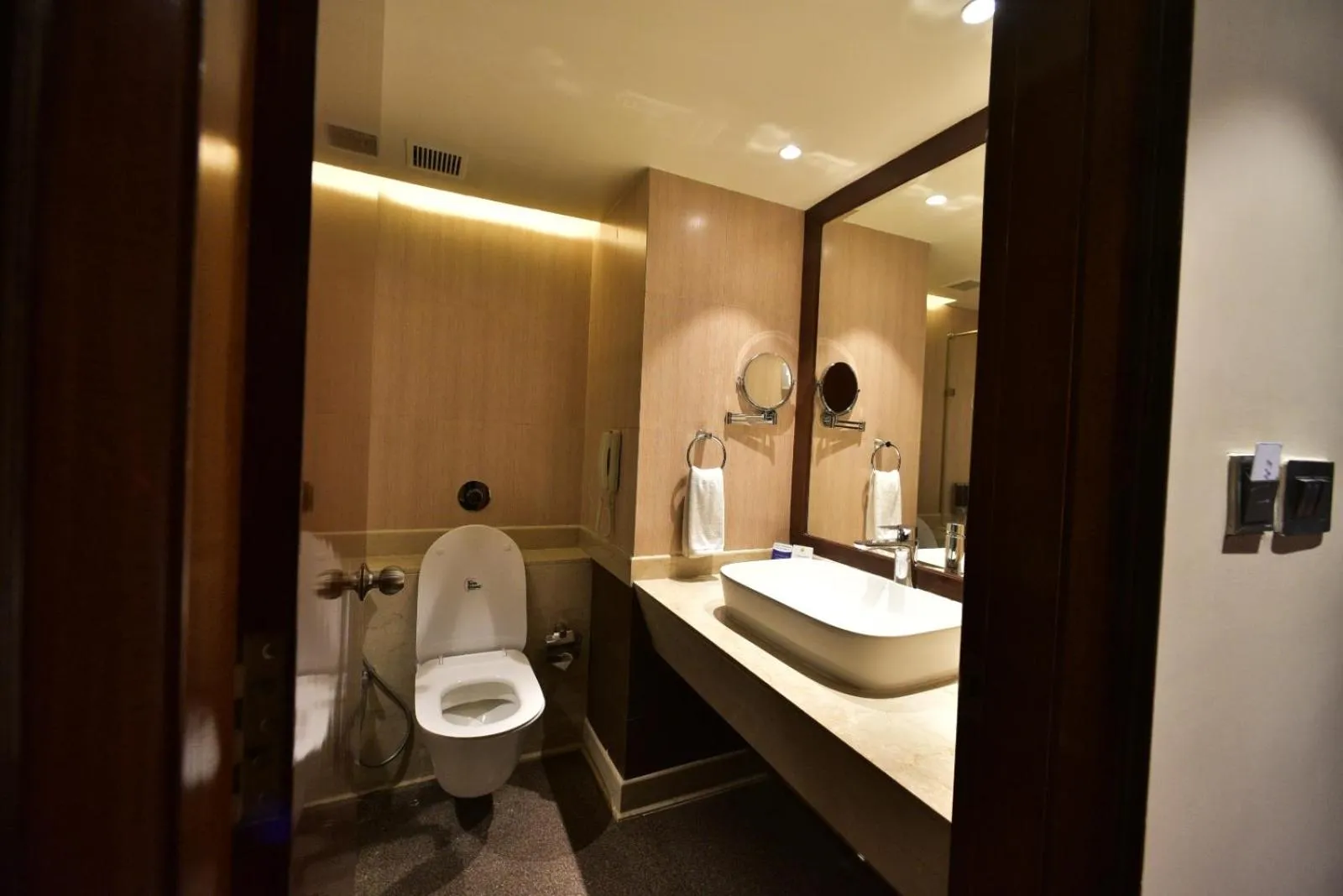 Bathroom in Citadel Sarovar Portico Bengaluru