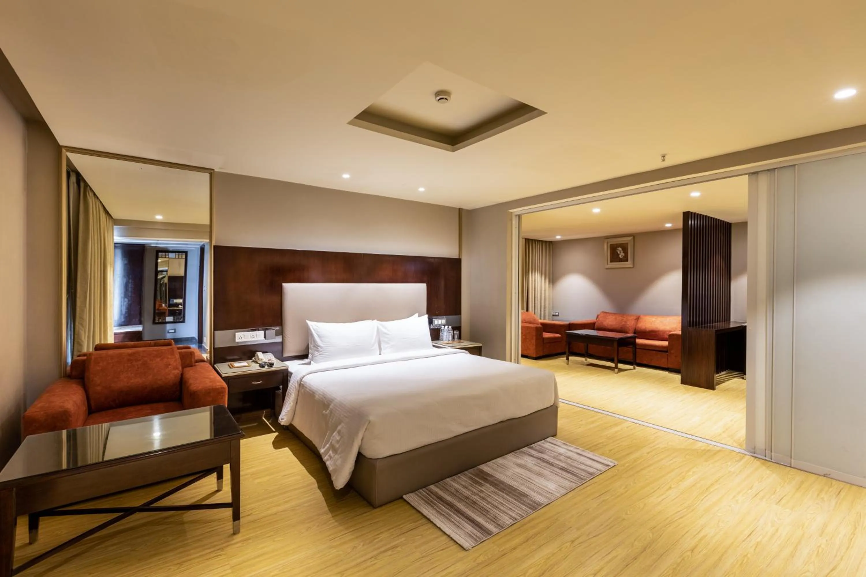 Bedroom, Bed in Citadel Sarovar Portico Bengaluru